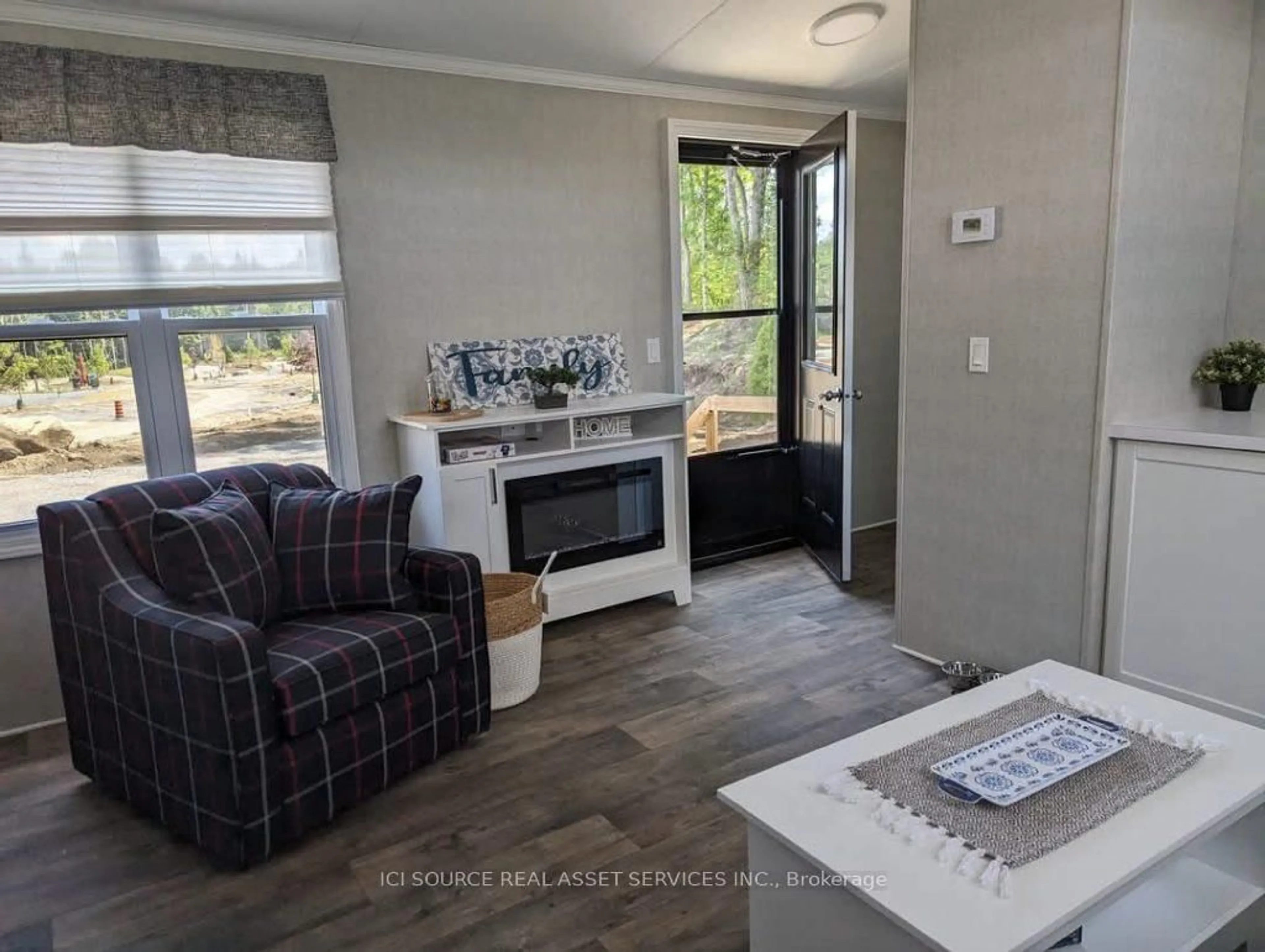 Living room with furniture, unknown for 1047 Bonnie Lake Camp Rd #LKR036, Bracebridge Ontario P1L 1W9