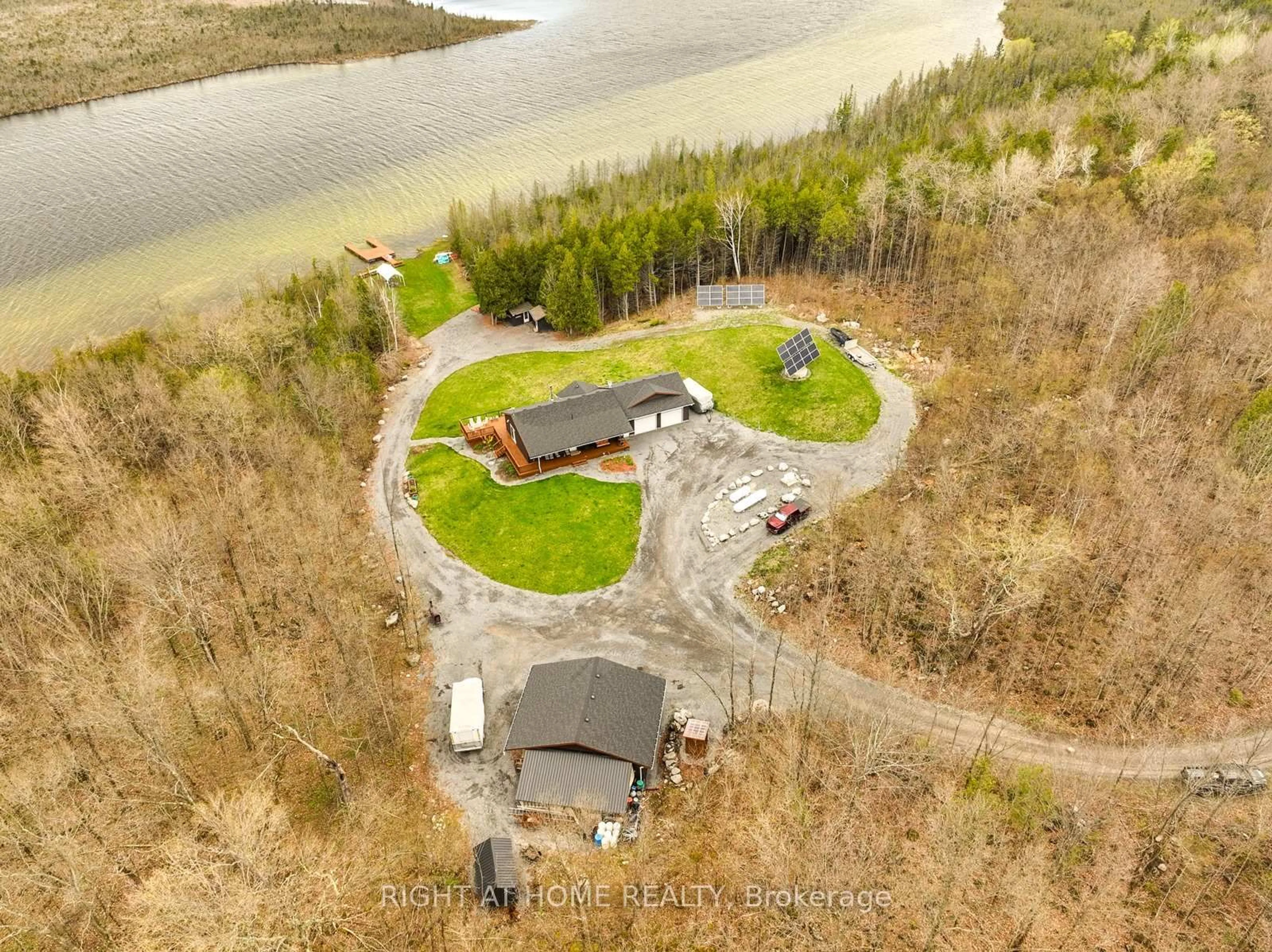 A pic from outside/outdoor area/front of a property/back of a property/a pic from drone, water/lake/river/ocean view for 452A COLDWATER Rd, Tweed Ontario K0K 2L0