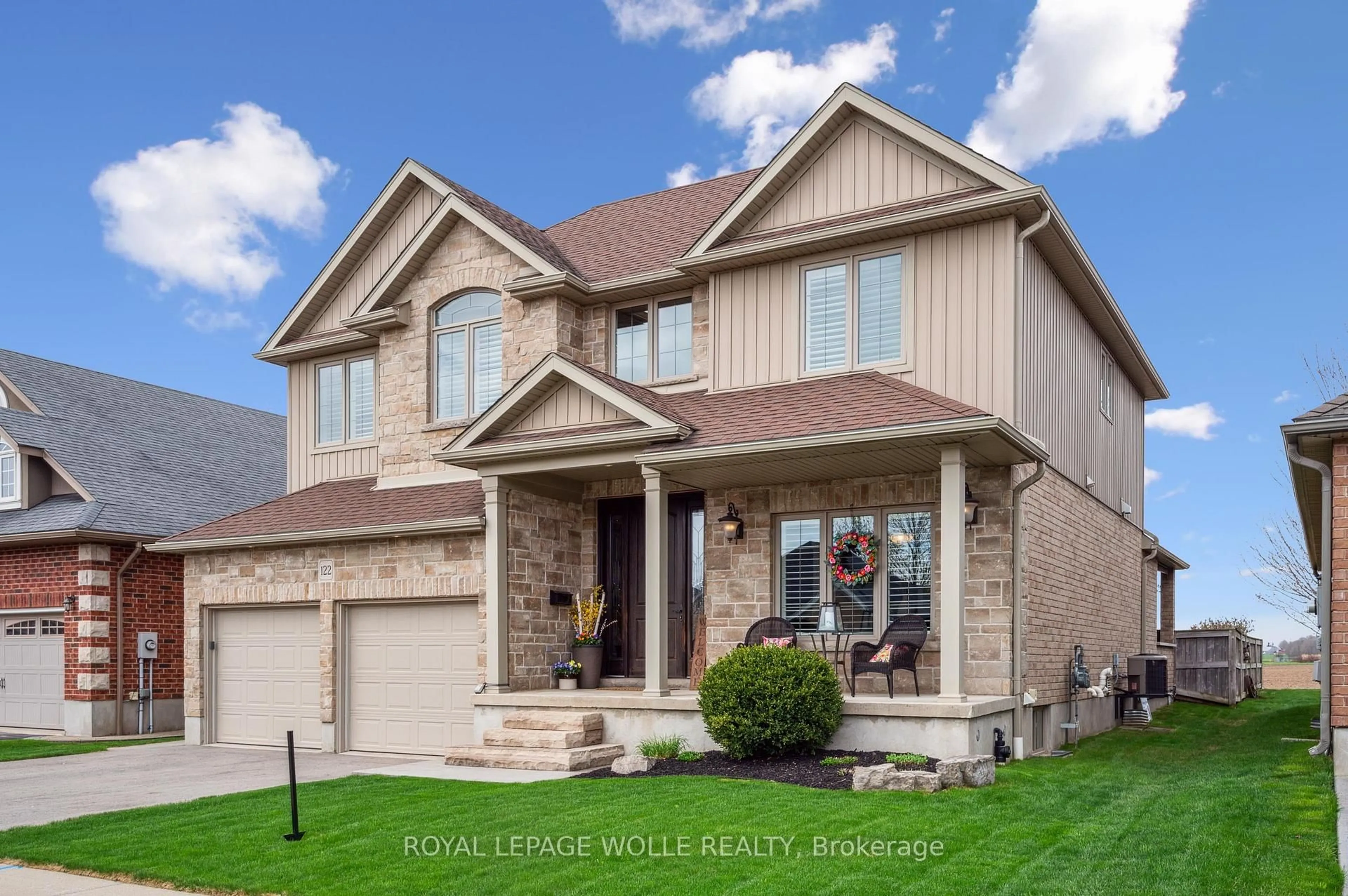 Home with brick exterior material, street for 122 Muscovey Dr, Woolwich Ontario N3B 3P7