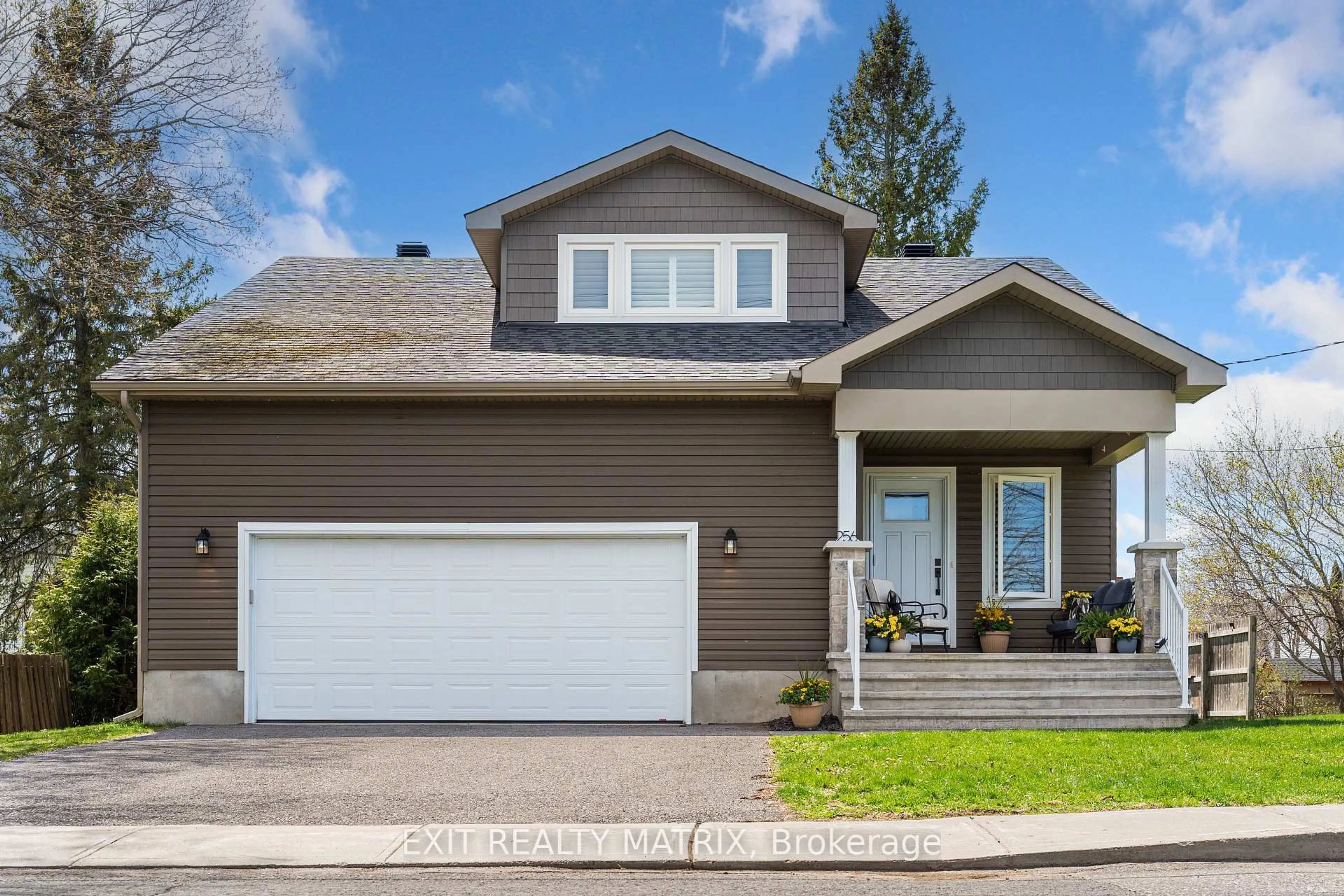 Home with vinyl exterior material, street for 256 Ann St, Almonte Ontario K0A 1A0