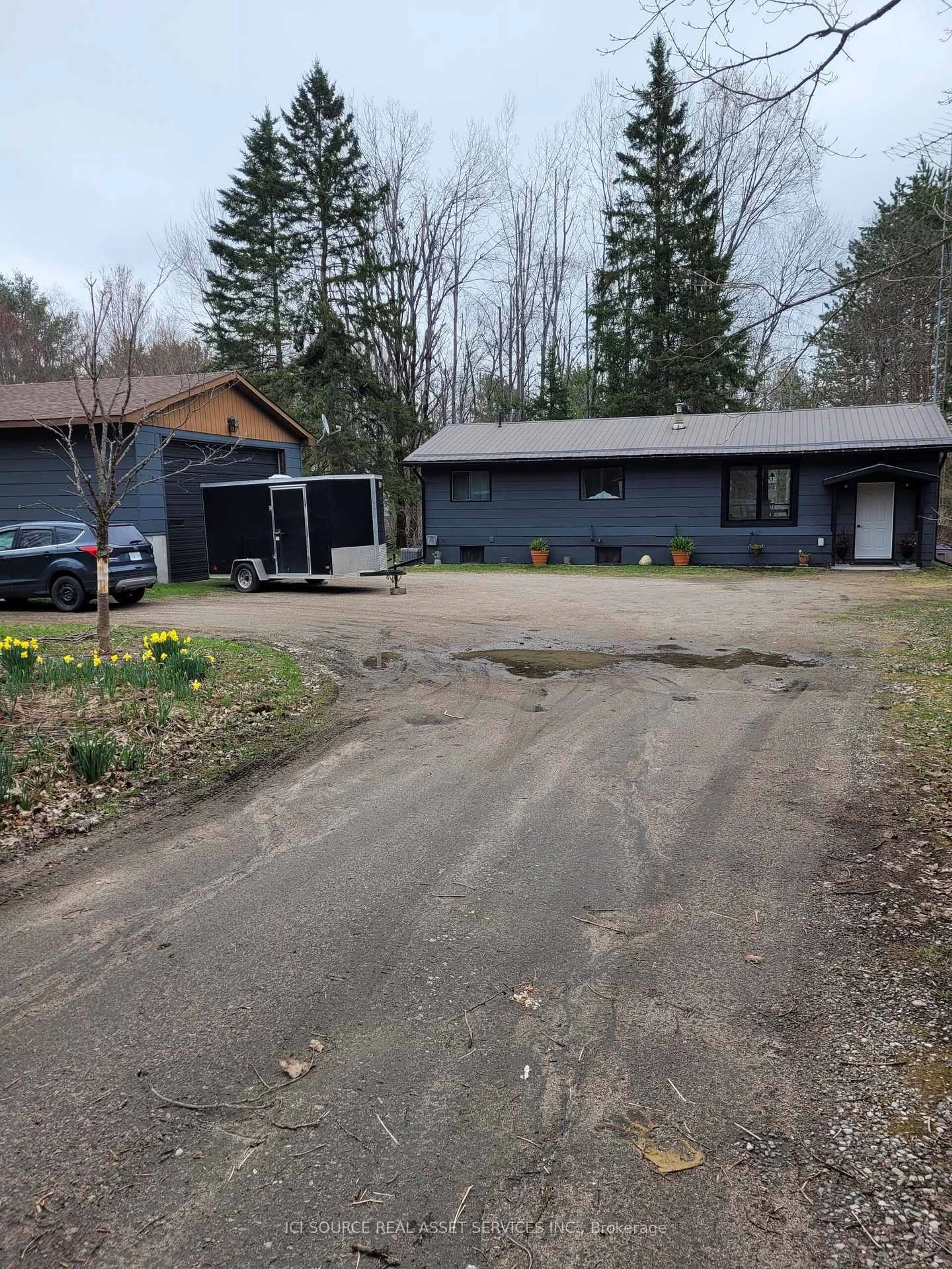 A pic from outside/outdoor area/front of a property/back of a property/a pic from drone, street for 3866 Deep Bay Rd, Minden Hills Ontario K0M 2K0