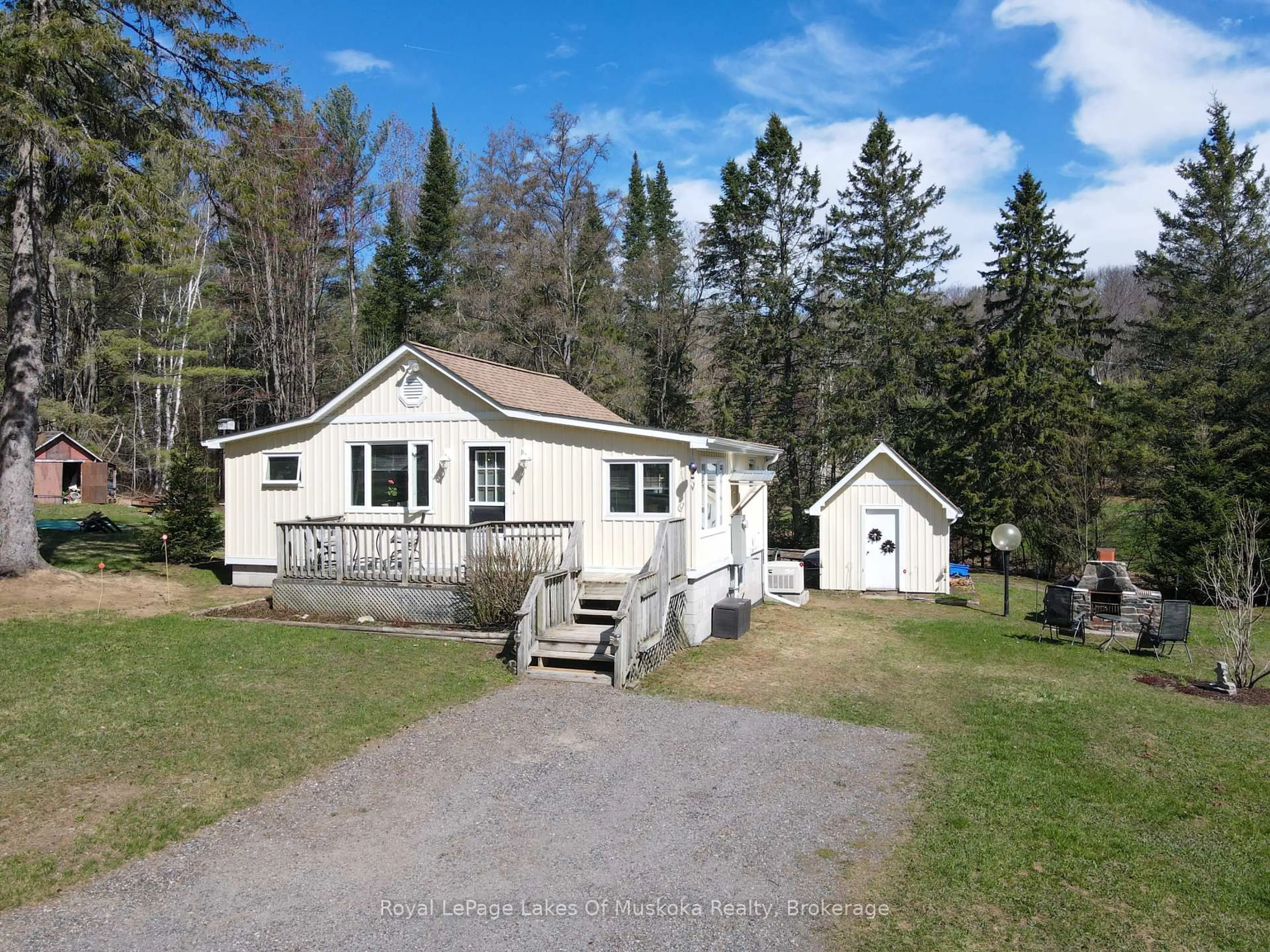 A pic from outside/outdoor area/front of a property/back of a property/a pic from drone, unknown for 944 Stephenson 1 Rd, Huntsville Ontario P0B 1L0