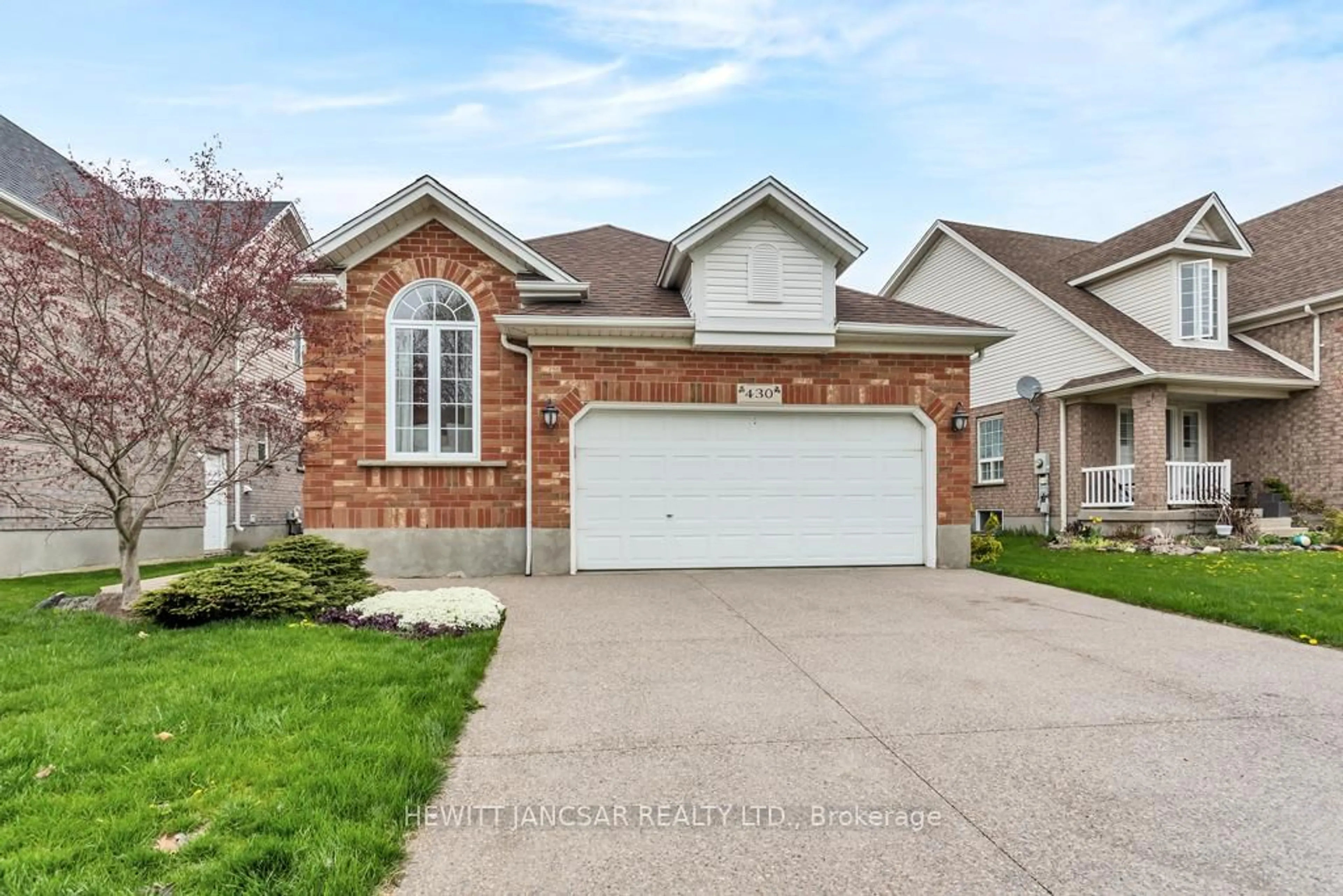 Home with brick exterior material, street for 430 Eastbridge Blvd, Waterloo Ontario N2K 3Y3