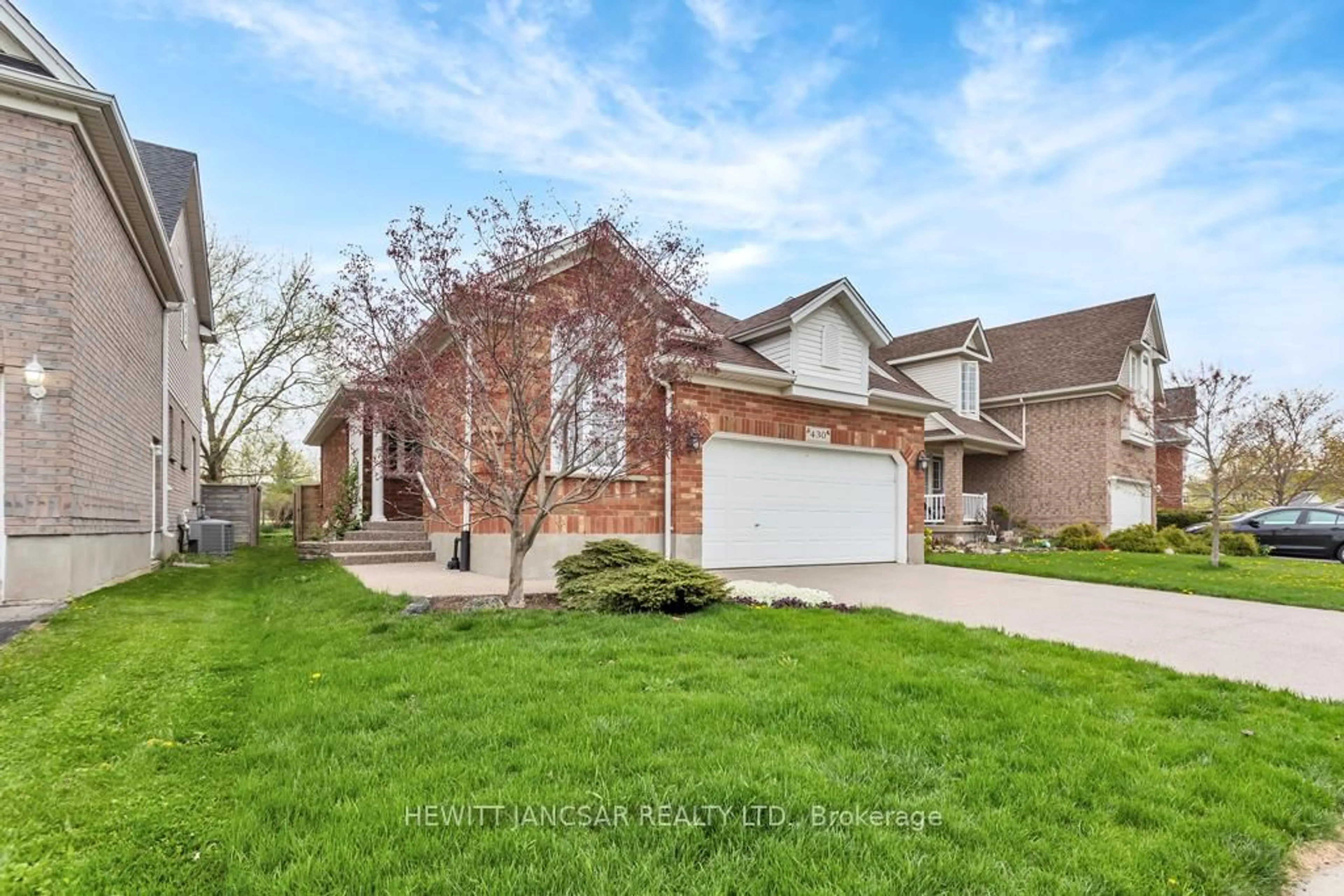 Home with brick exterior material, street for 430 Eastbridge Blvd, Waterloo Ontario N2K 3Y3