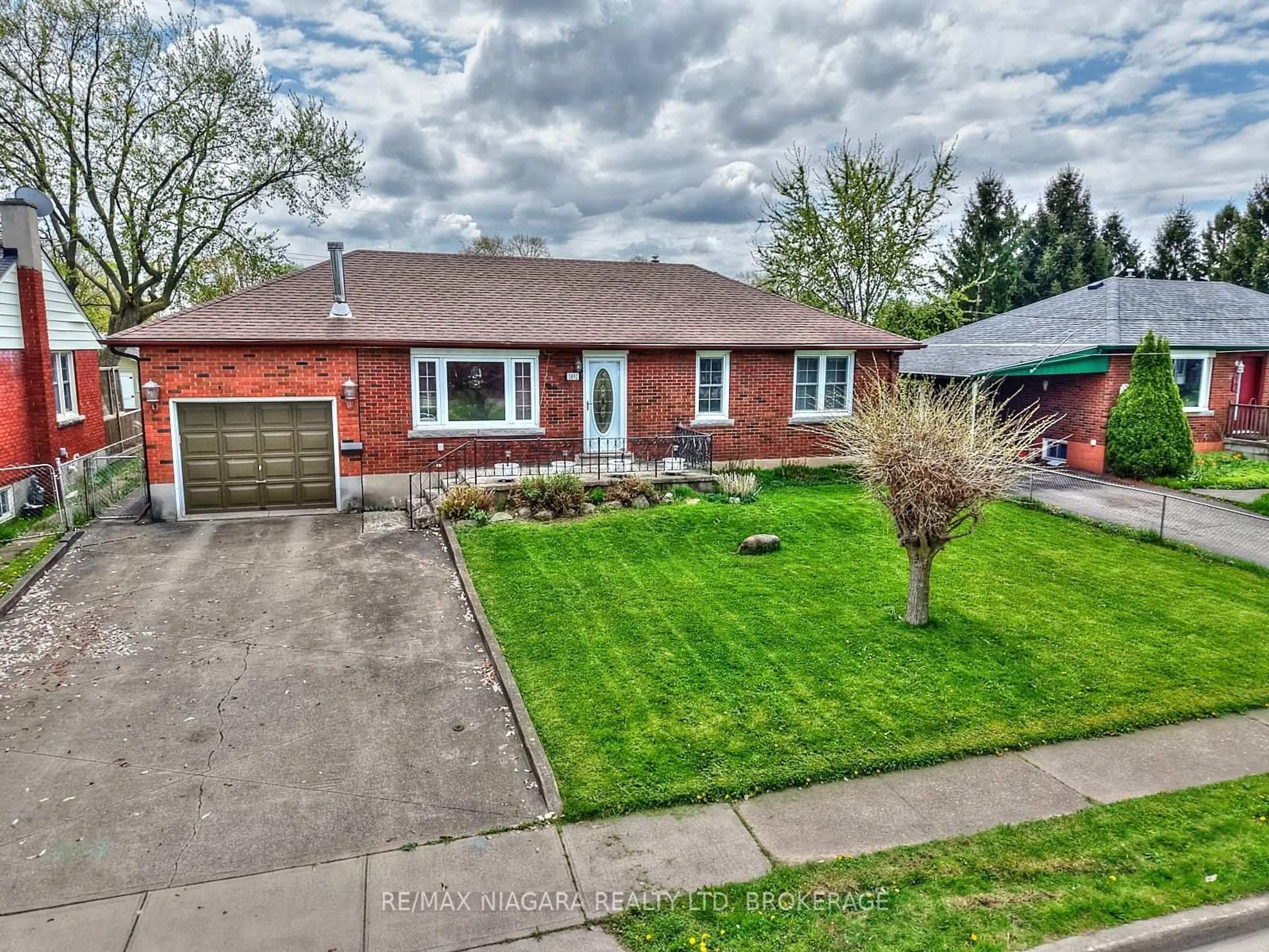 Home with brick exterior material, street for 5892 Carman St, Niagara Falls Ontario L2J 1S1