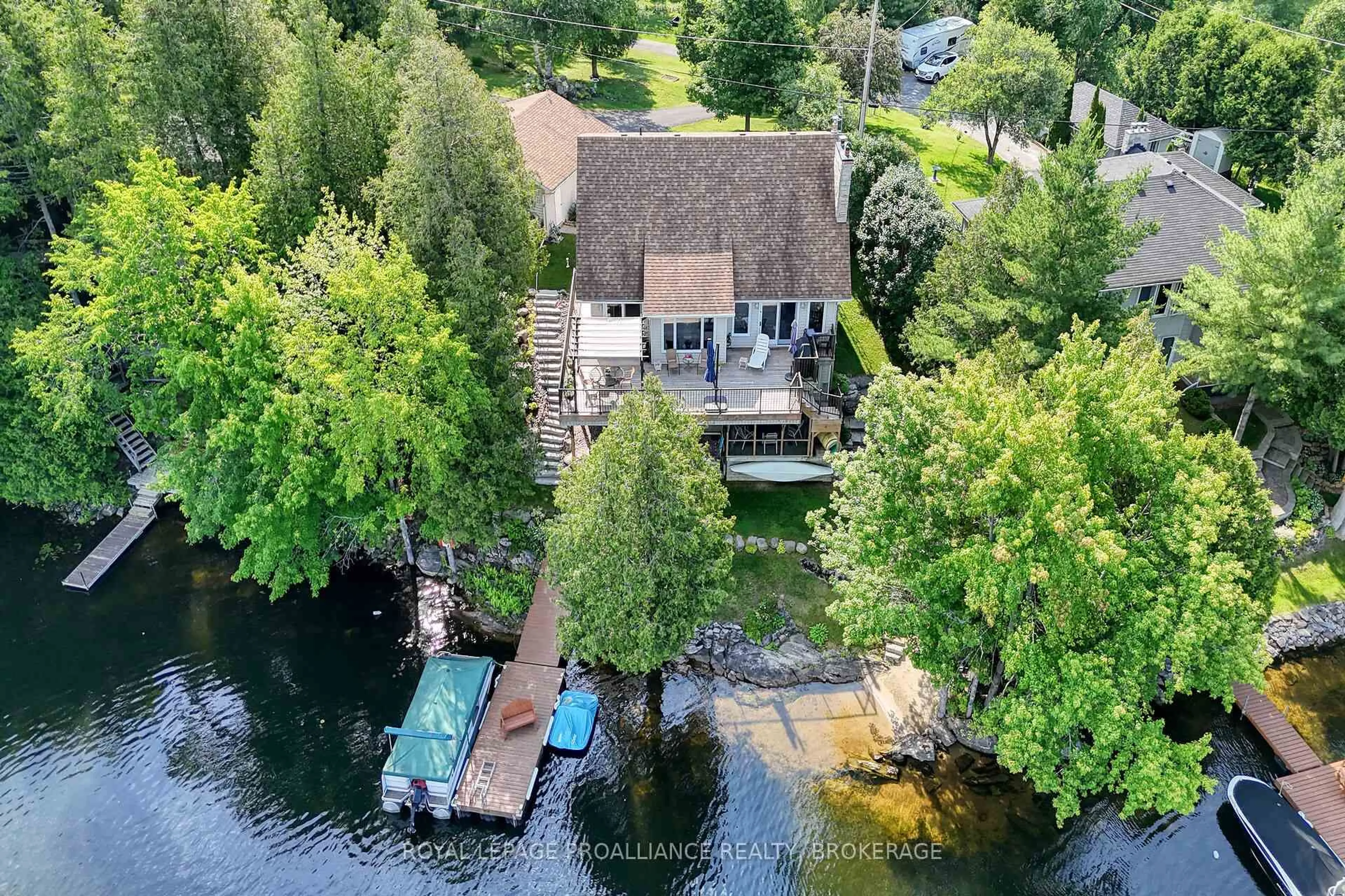 A pic from outside/outdoor area/front of a property/back of a property/a pic from drone, water/lake/river/ocean view for 1016 Rocky Shore Lane, Hartington Ontario K0H 1W0