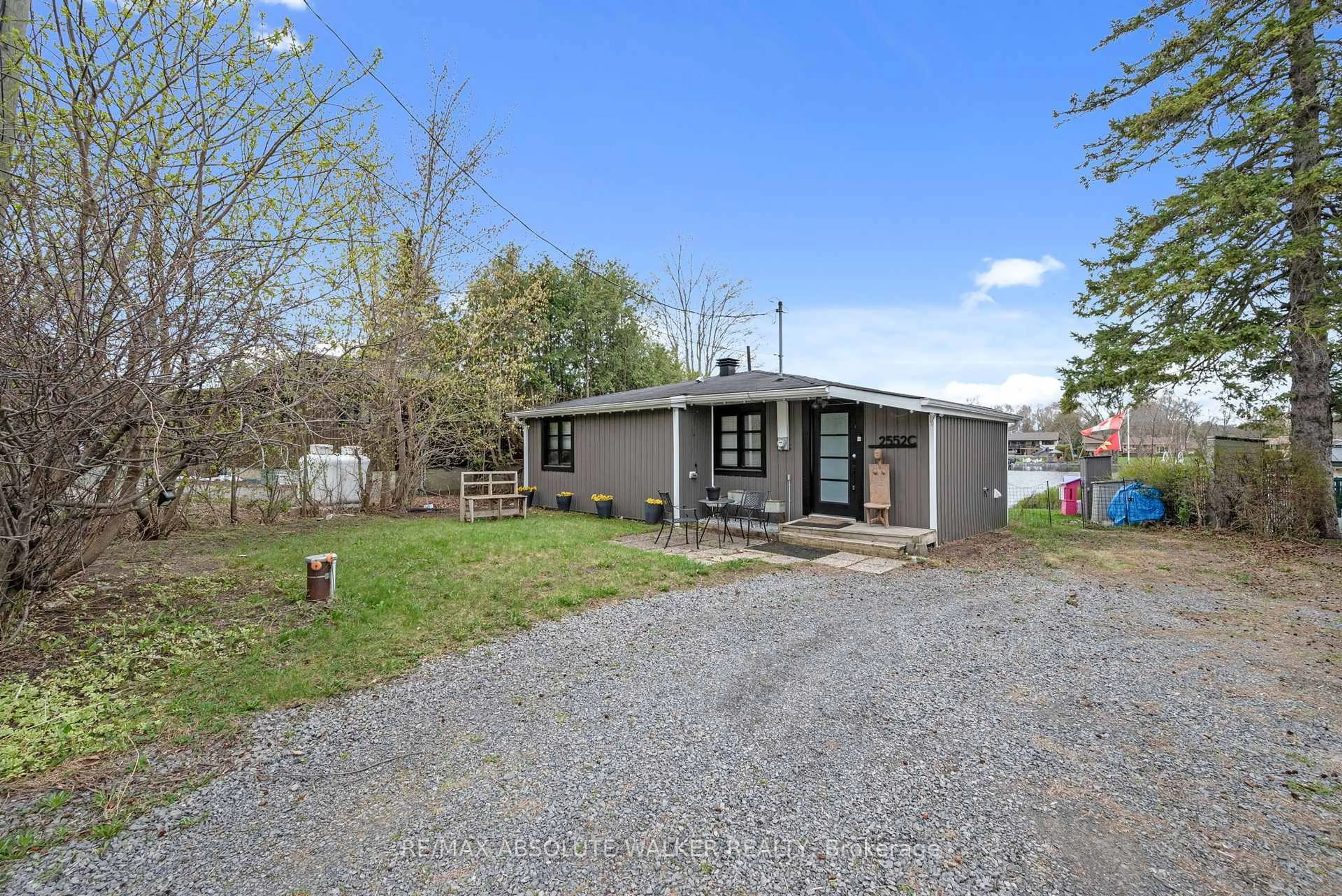 A pic from outside/outdoor area/front of a property/back of a property/a pic from drone, street for 2552C River Rd, Ottawa Ontario K4M 1B4