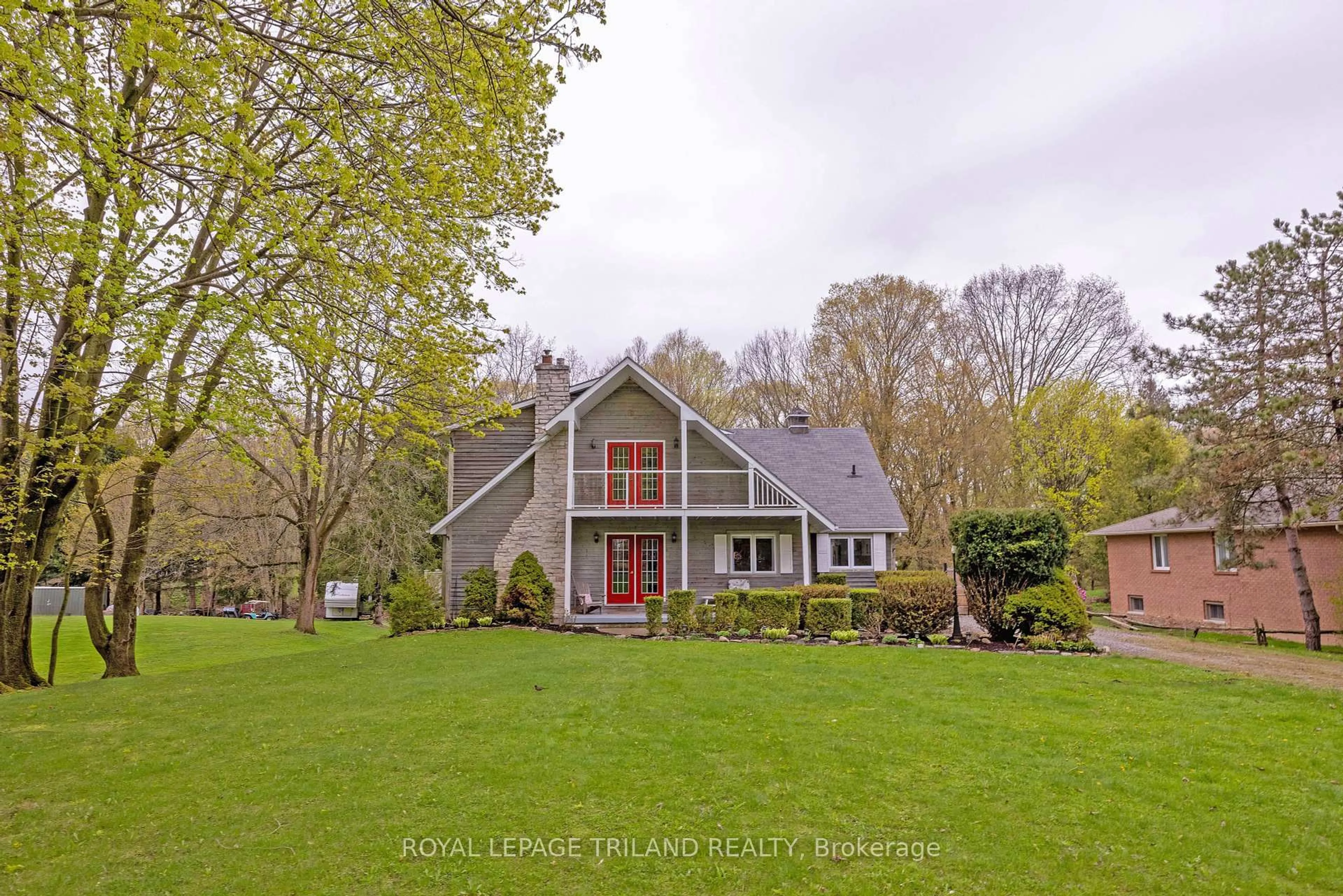 A pic from outside/outdoor area/front of a property/back of a property/a pic from drone, water/lake/river/ocean view for 37412 Lake Line, Southwold Ontario N5L 1J1
