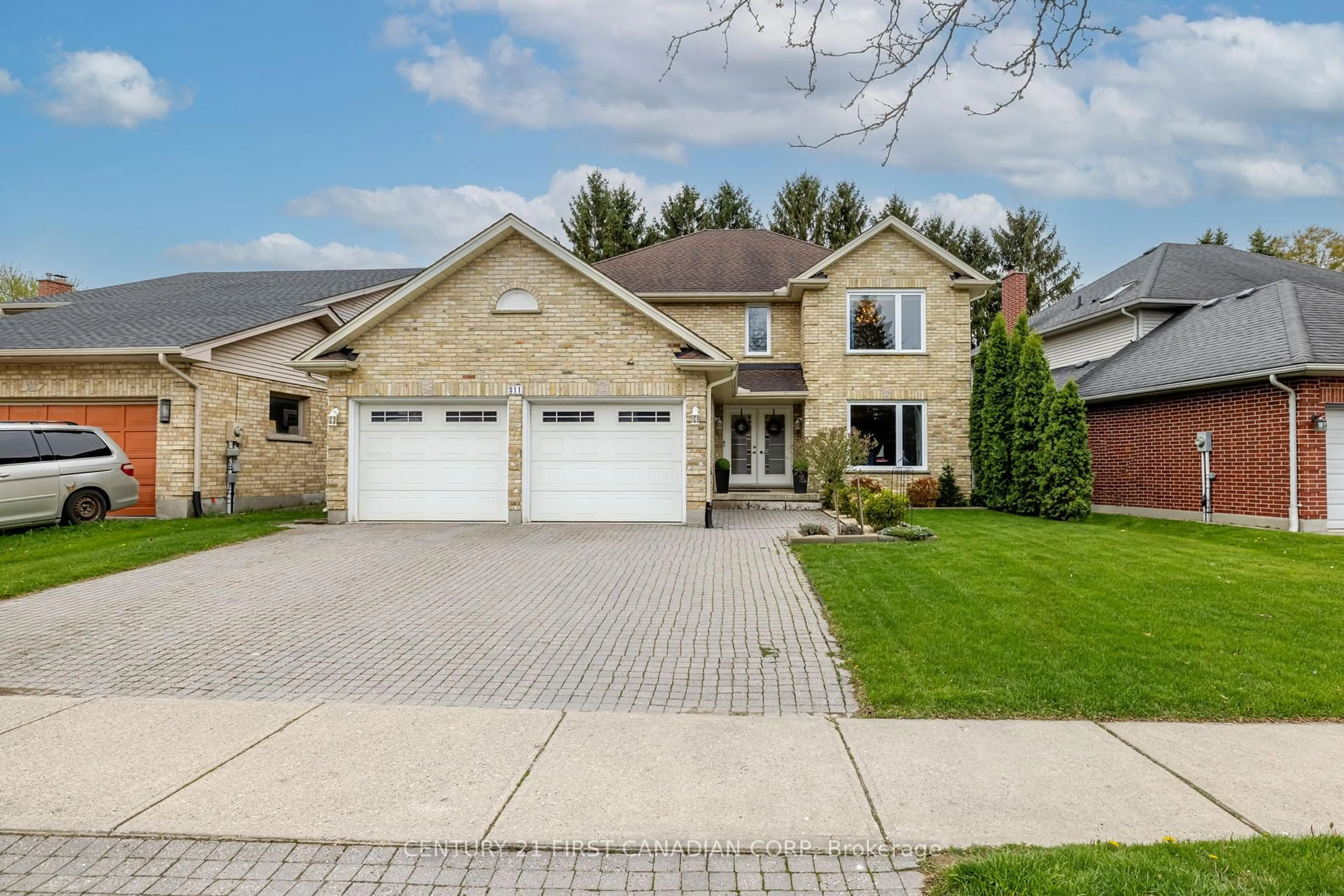 Home with brick exterior material, street for 311 Ambleside Dr, London North Ontario N6G 4V8