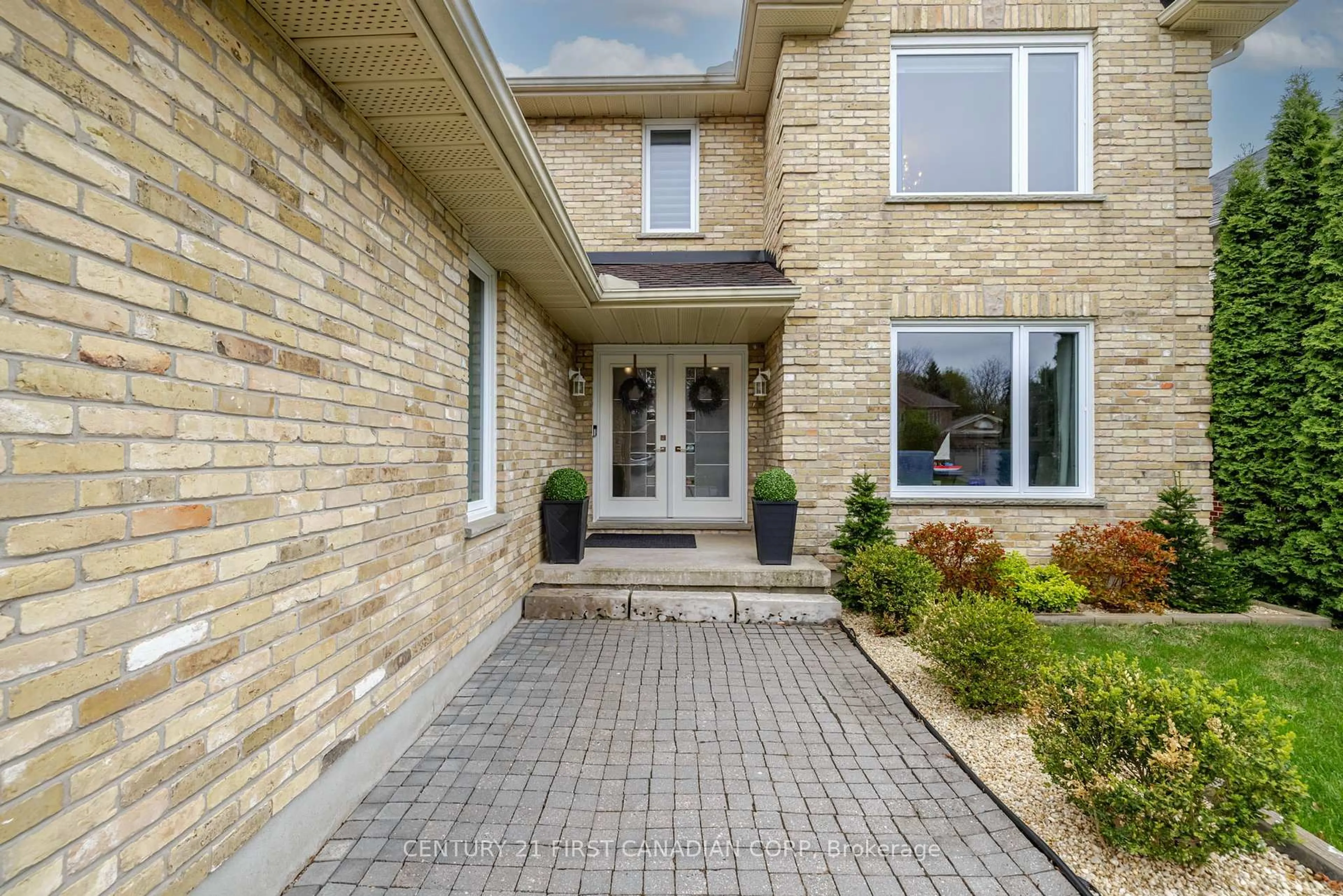 Home with brick exterior material, street for 311 Ambleside Dr, London North Ontario N6G 4V8
