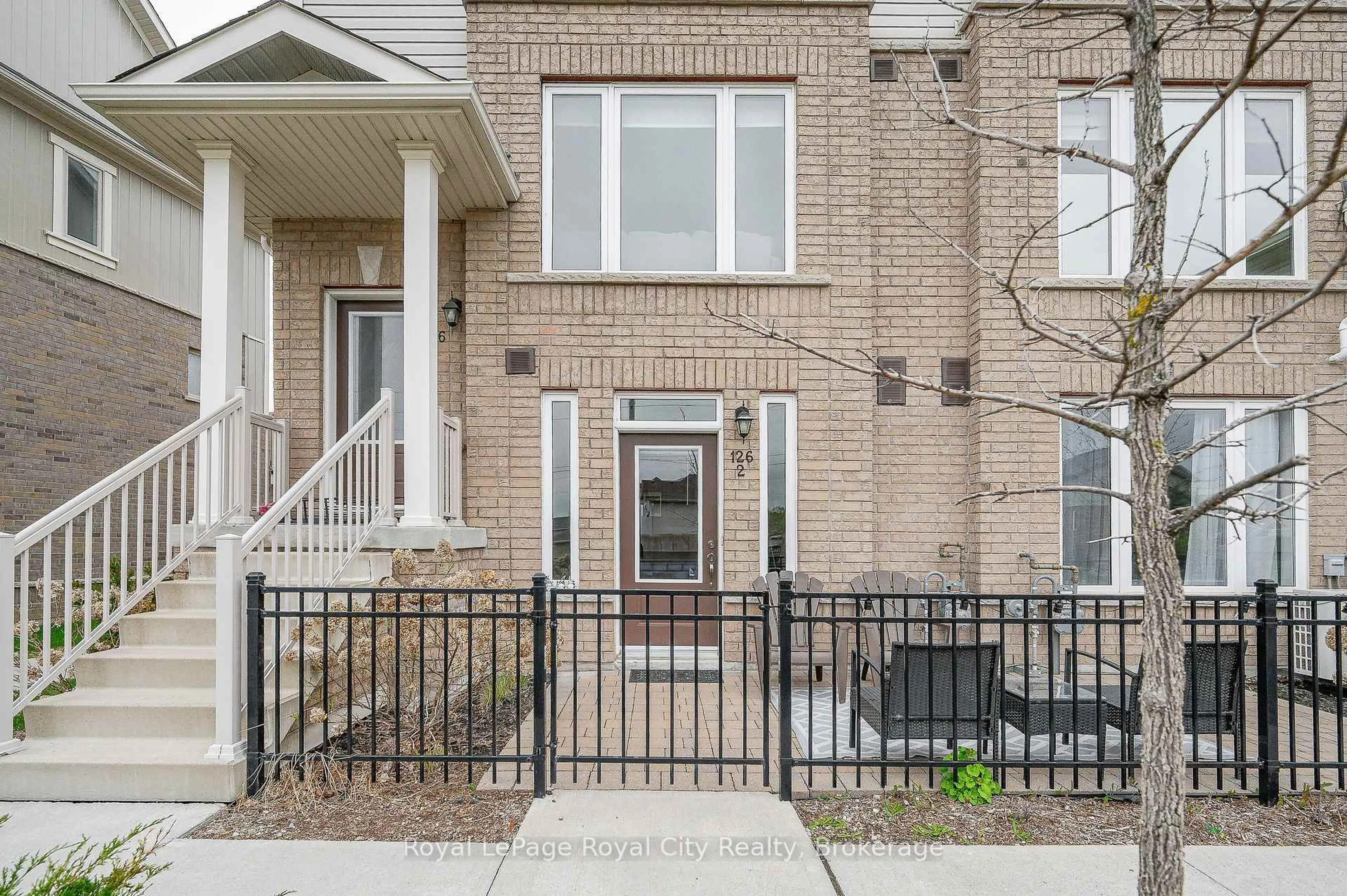 Home with brick exterior material, street for 126 Watson Pkwy #2, Guelph Ontario N1E 0P6