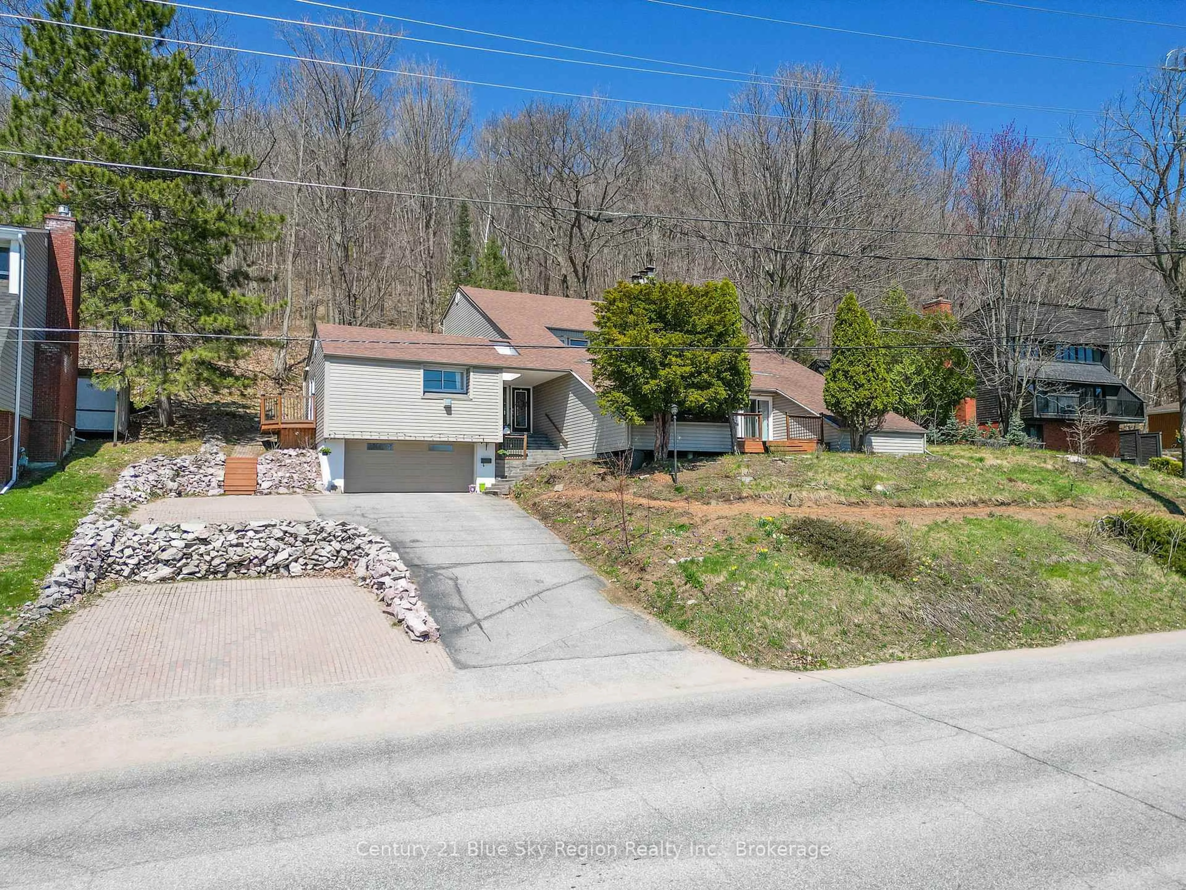 A pic from outside/outdoor area/front of a property/back of a property/a pic from drone, street for 856 Ski Club Rd, North Bay Ontario P1B 8E5