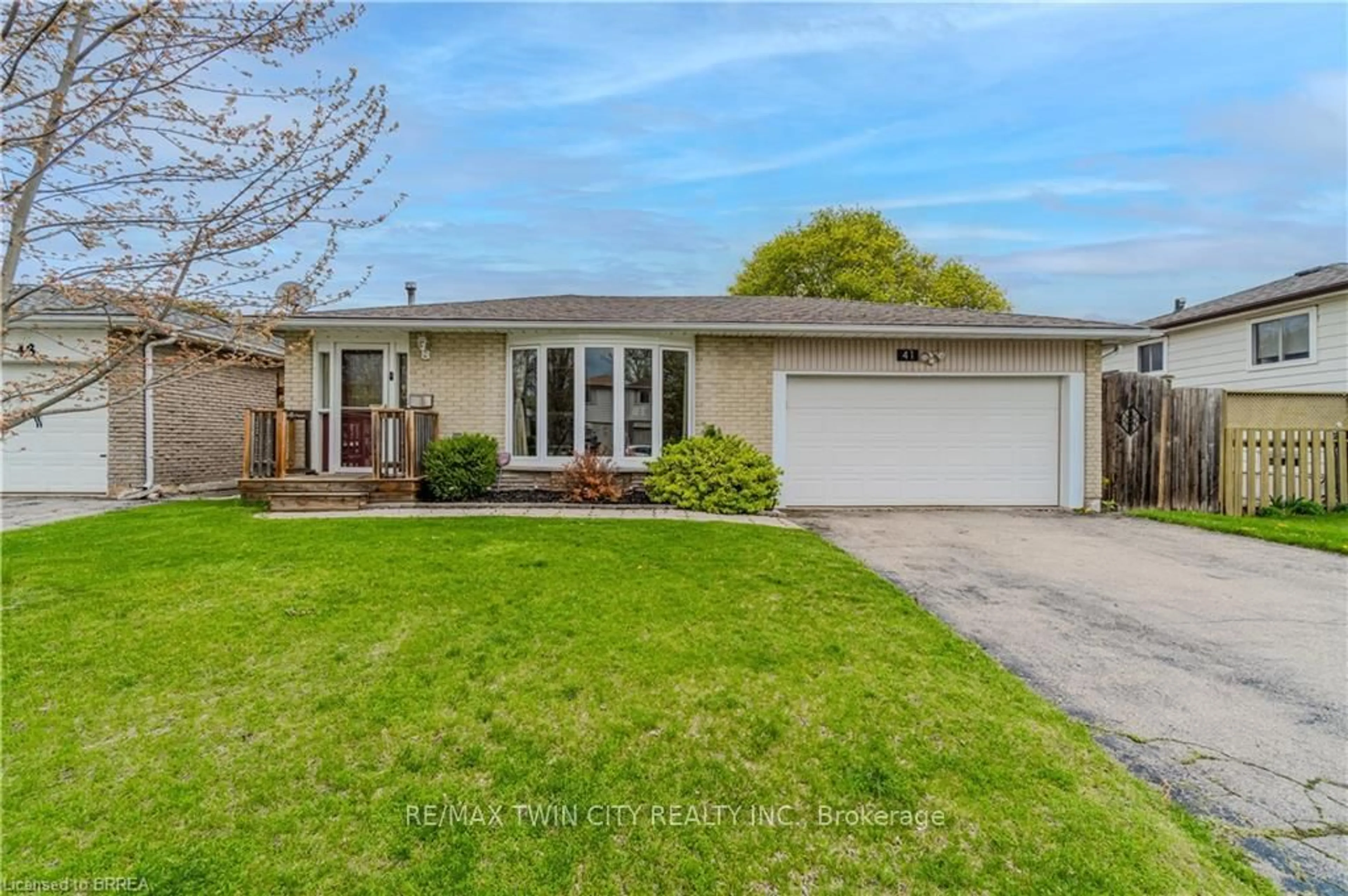 Home with vinyl exterior material, street for 41 Forest Dr, Brant Ontario N3L 3M1