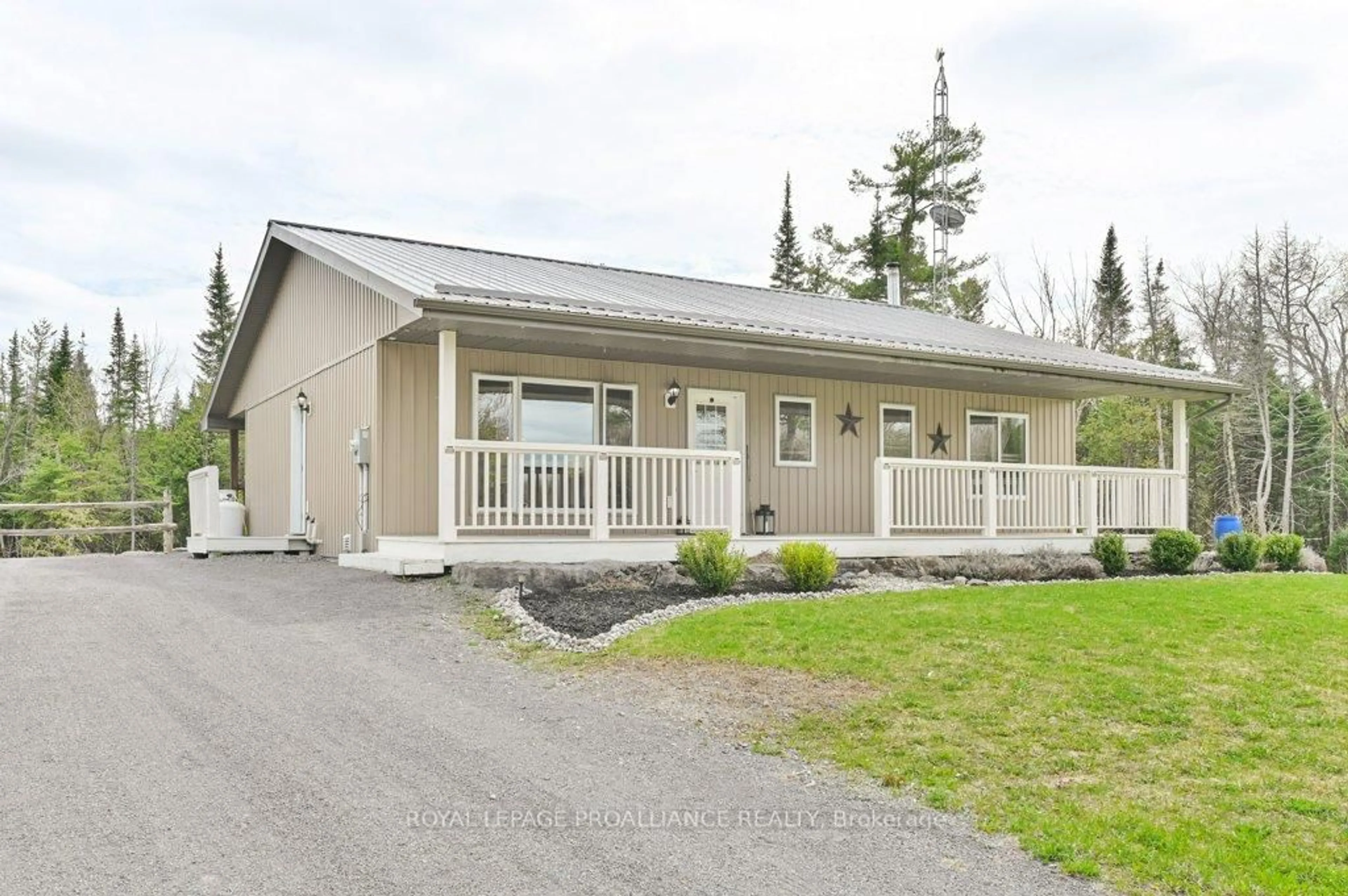 Home with vinyl exterior material, street for 1554 SHANNON Rd, Tyendinaga Ontario K0K 2V0