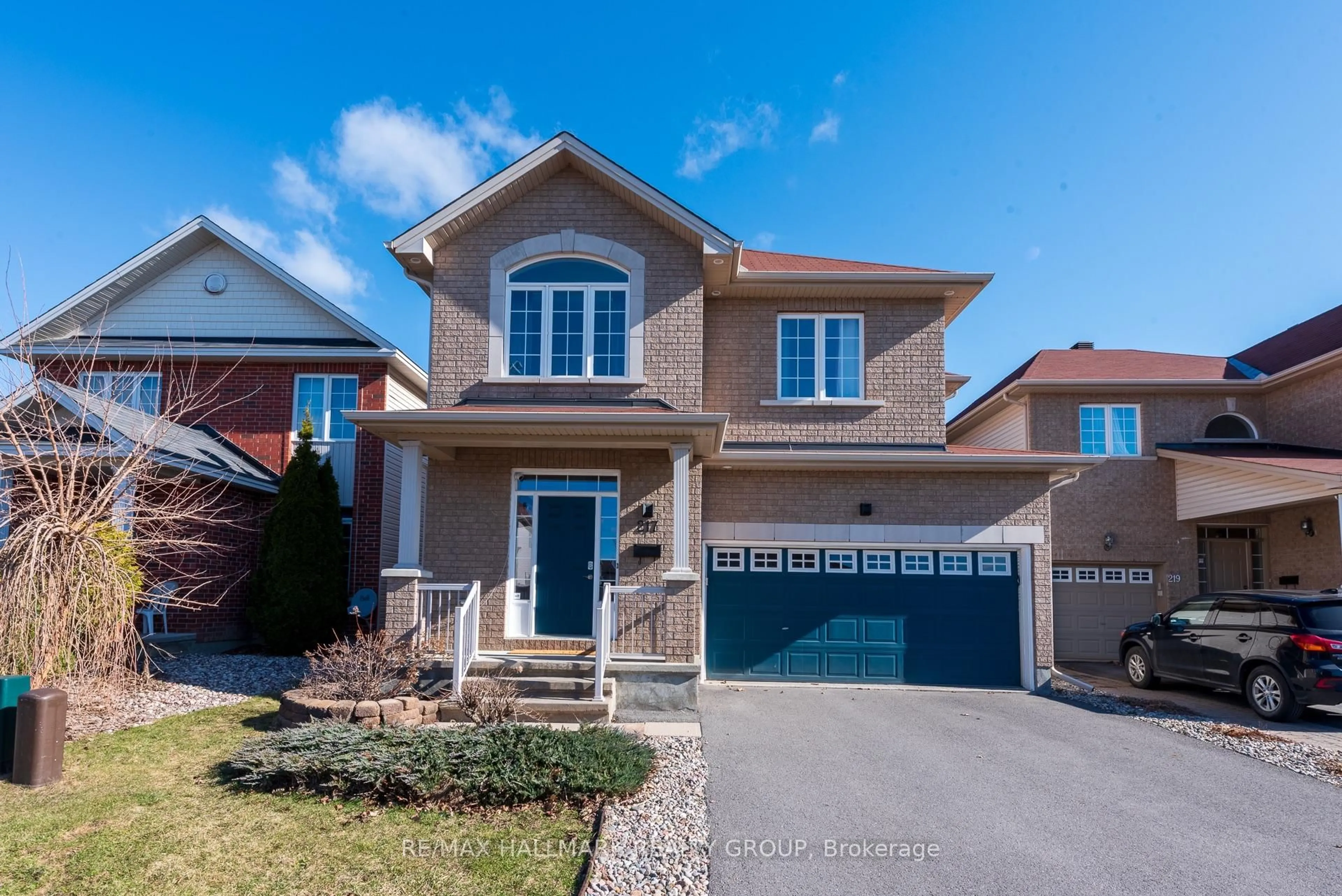 Home with brick exterior material, street for 217 Fountainhead Dr, Ottawa Ontario K1W 0C2