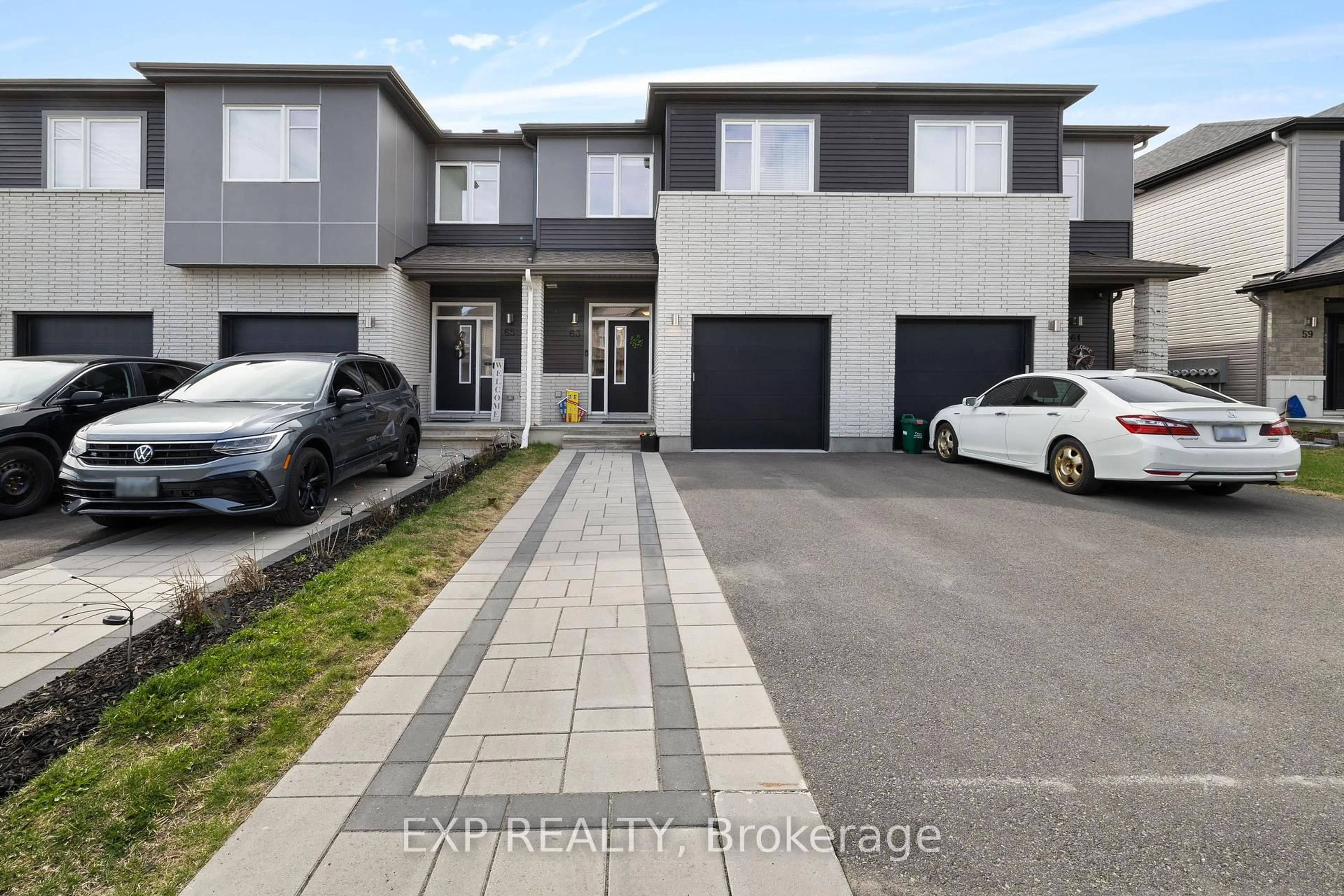 A pic from outside/outdoor area/front of a property/back of a property/a pic from drone, street for 63 Jardiniere St, Stittsville Ontario K2S 2K5