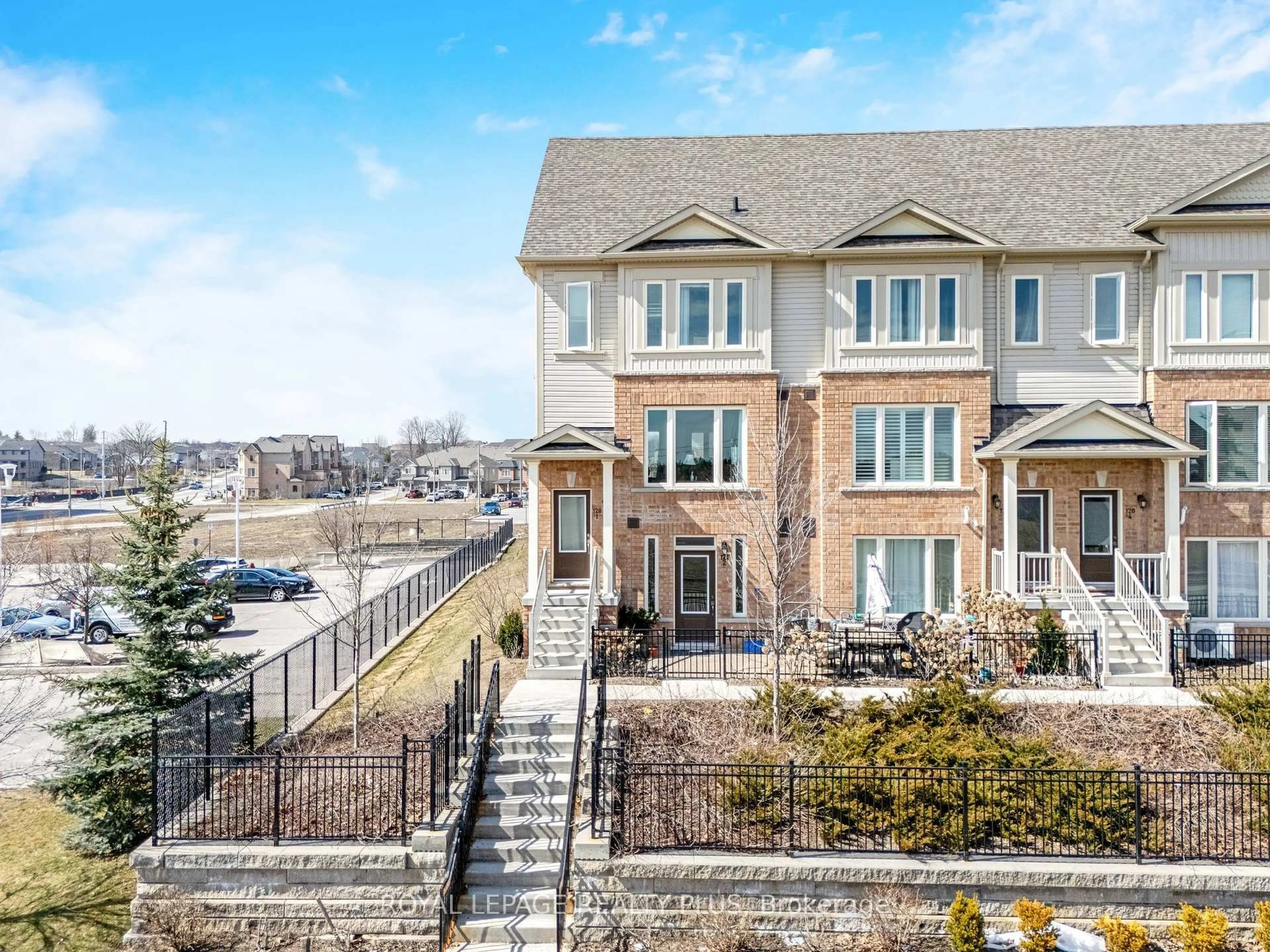 A pic from outside/outdoor area/front of a property/back of a property/a pic from drone, street for 120 Watson Pkwy #1, Guelph Ontario N1E 0P6