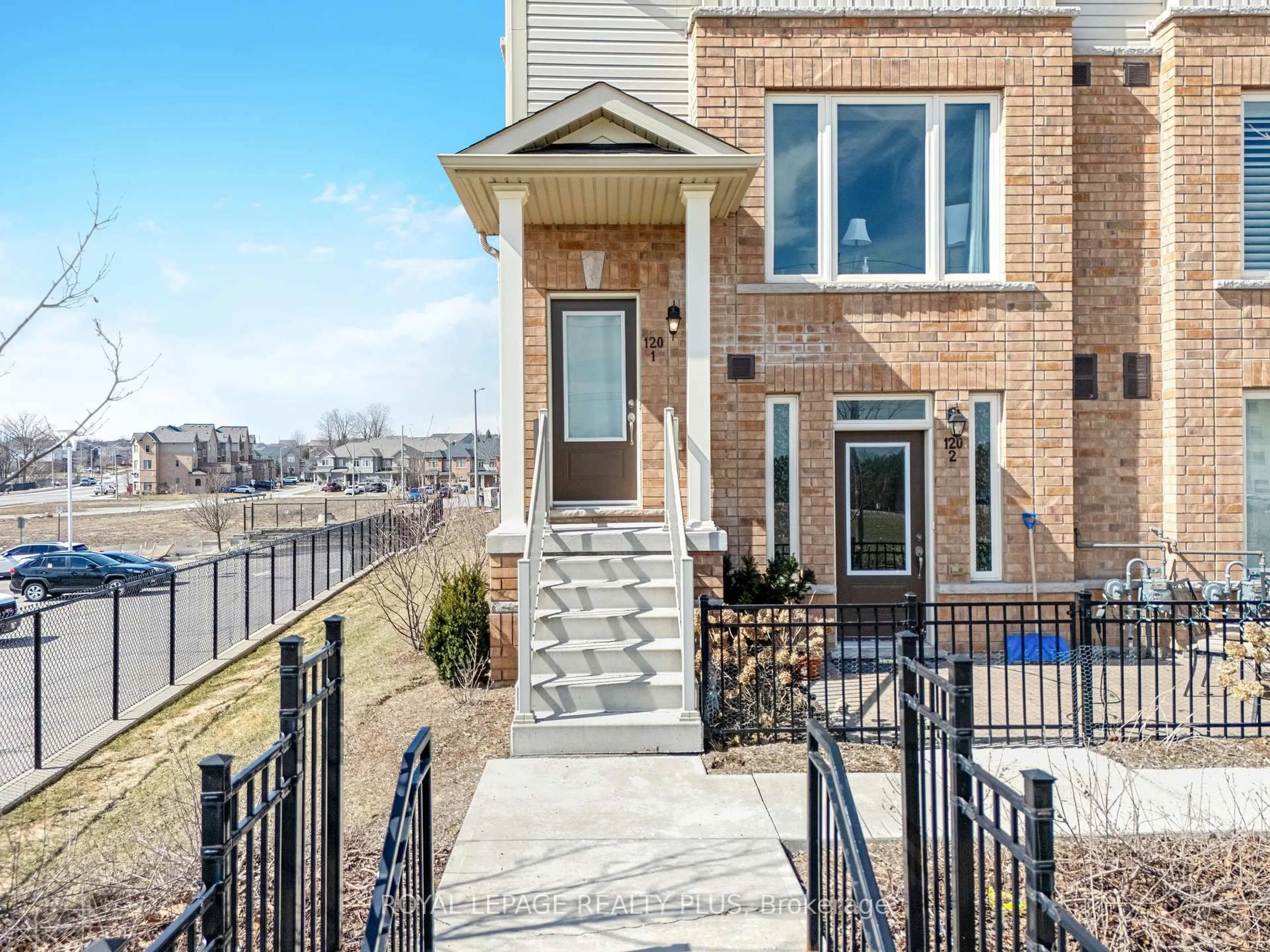 Home with brick exterior material, street for 120 Watson Pkwy #1, Guelph Ontario N1E 0P6