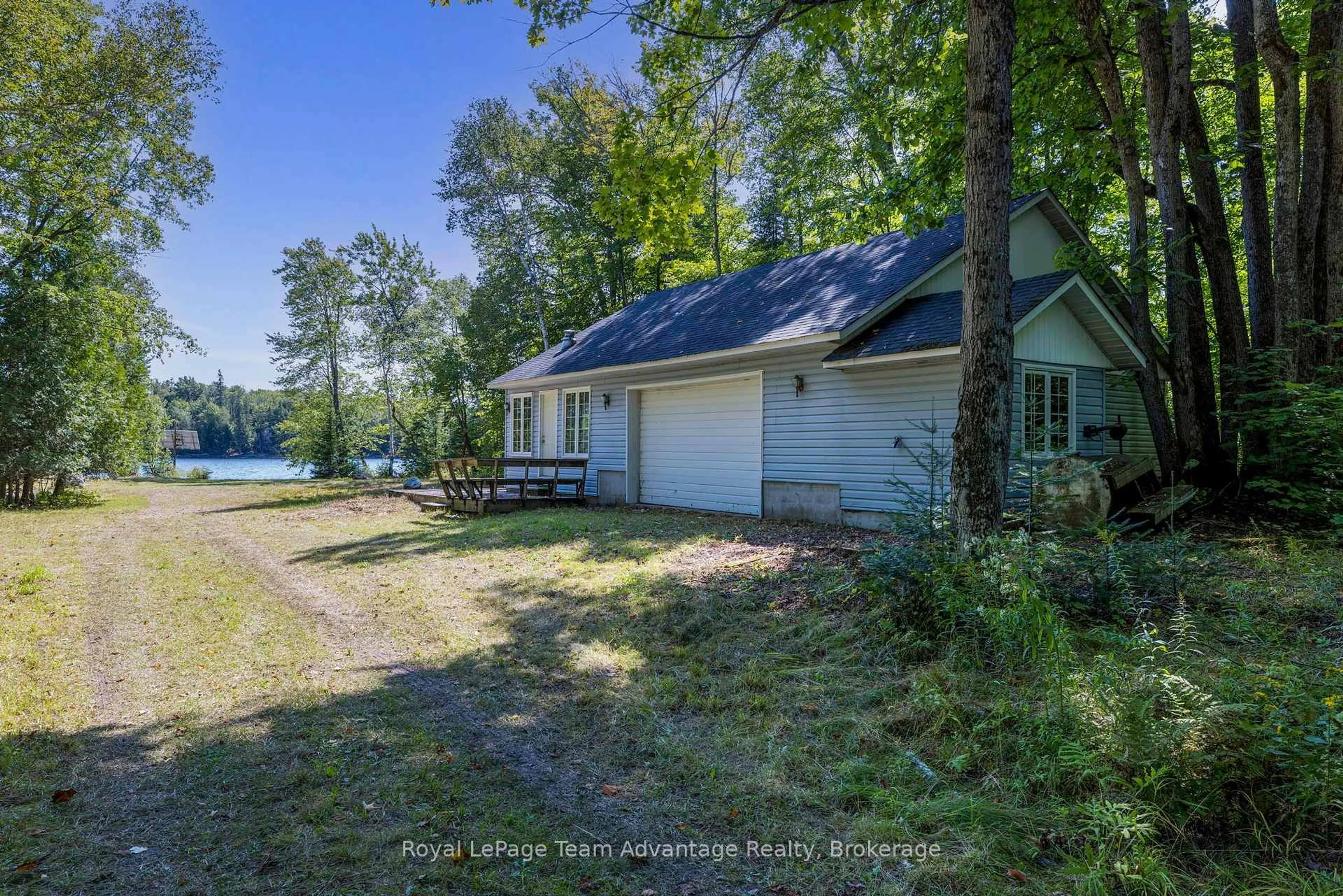 A pic from outside/outdoor area/front of a property/back of a property/a pic from drone, water/lake/river/ocean view for 46 Taylor Lake Rd, Whitestone Ontario P0A 1G0