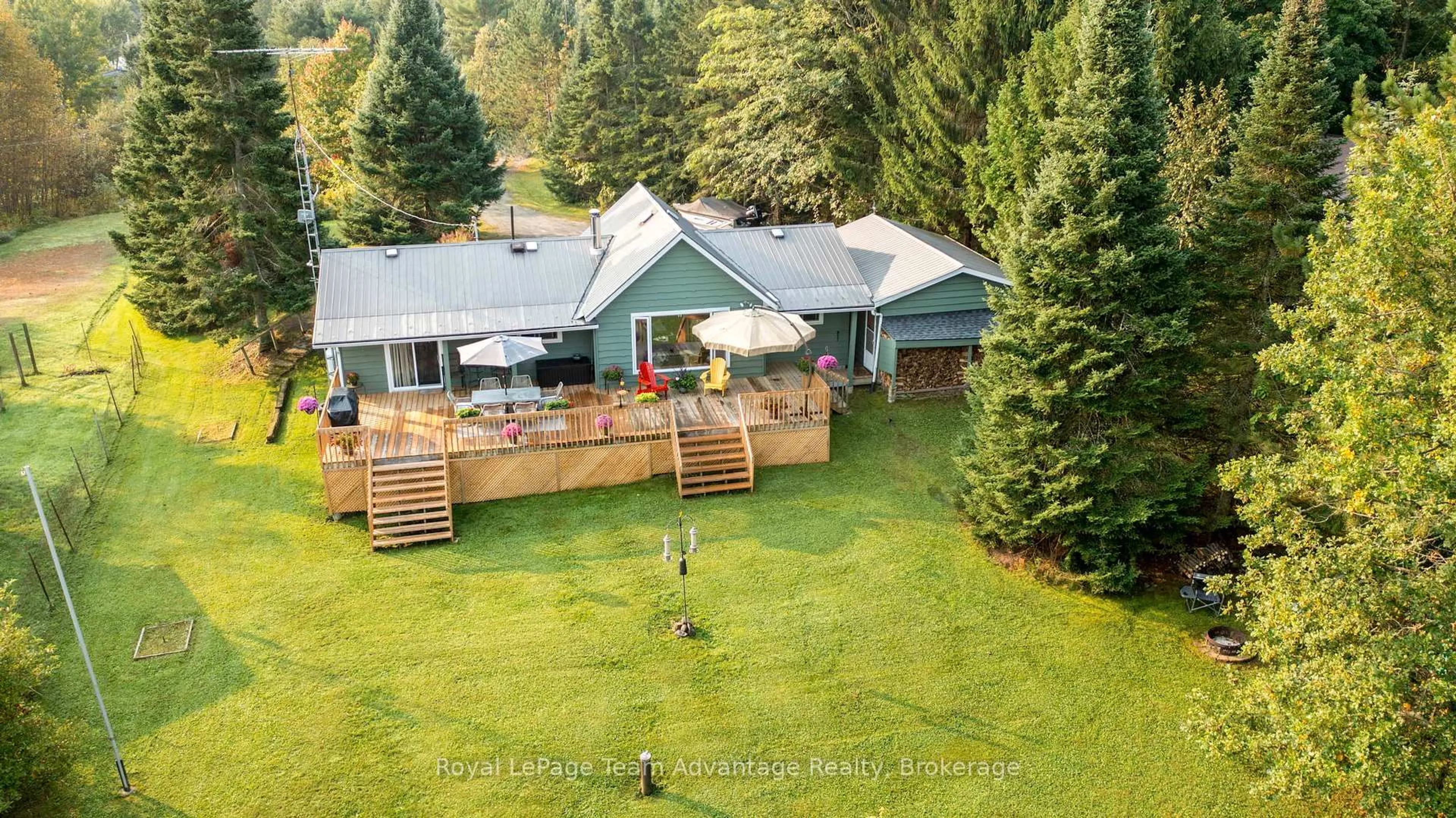 A pic from outside/outdoor area/front of a property/back of a property/a pic from drone, unknown for 88 Stoney Rd, McKellar Ontario P0G 1C0