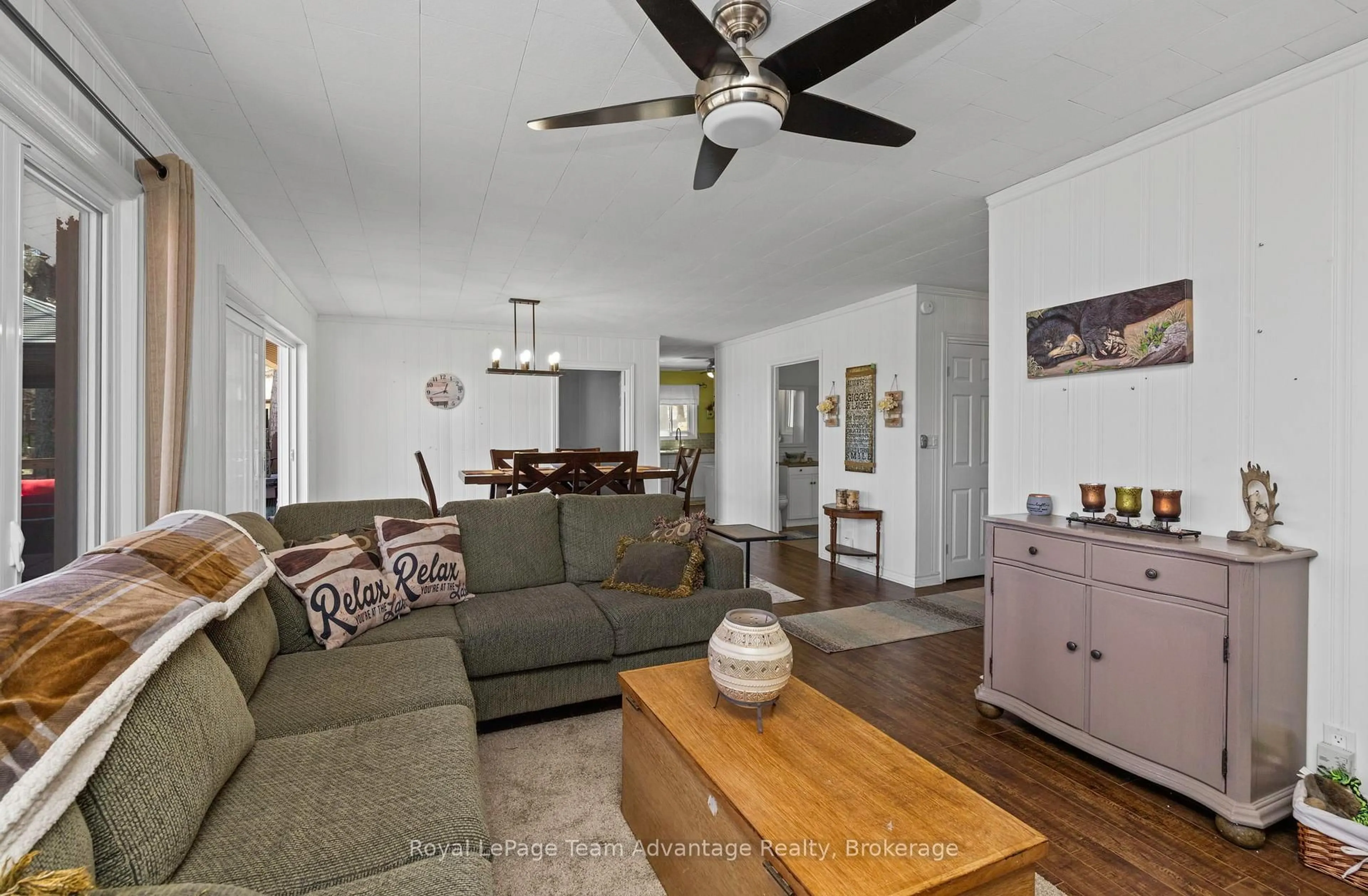 Living room with furniture, wood/laminate floor for 758 Paradise Lane, Parry Sound Ontario P2A 2X4