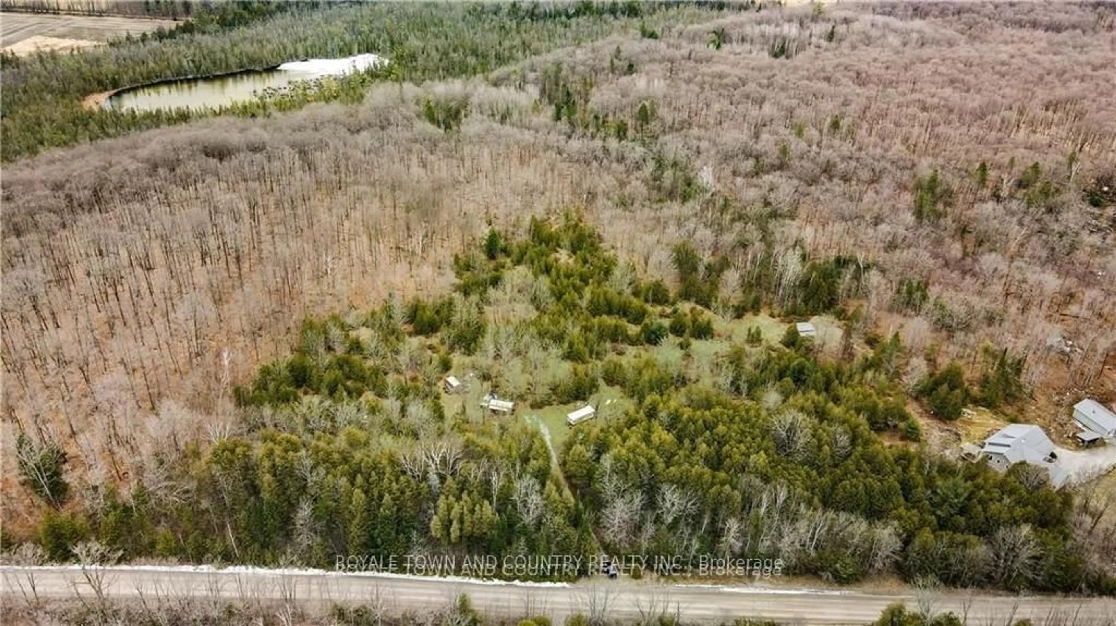 A pic from outside/outdoor area/front of a property/back of a property/a pic from drone, forest/trees view for 267 Hilton's Point Rd, Kawartha Lakes Ontario K0M 2L0
