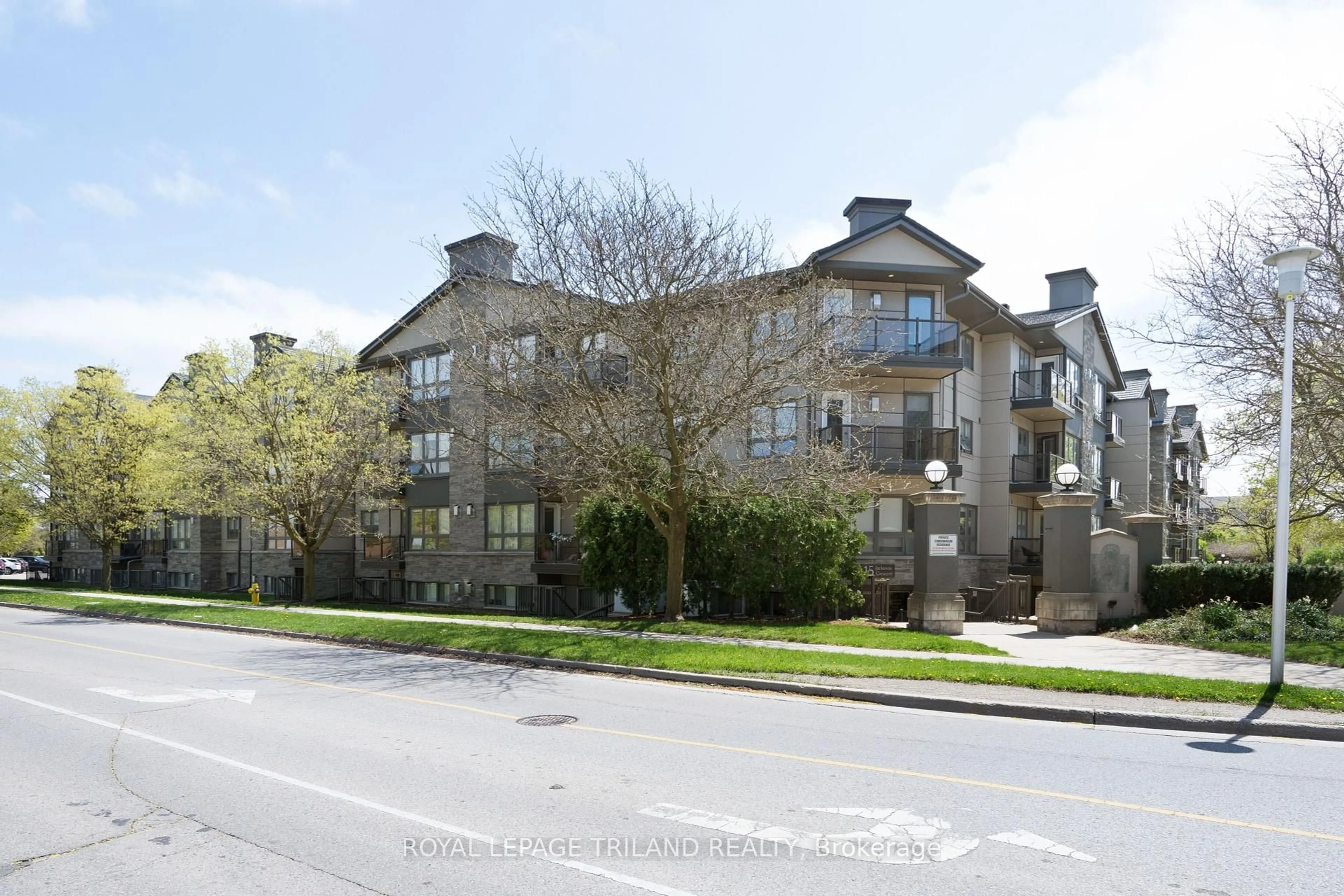 A pic from outside/outdoor area/front of a property/back of a property/a pic from drone, unknown for 15 Jacksway Cres #315, London North Ontario N5X 3T8