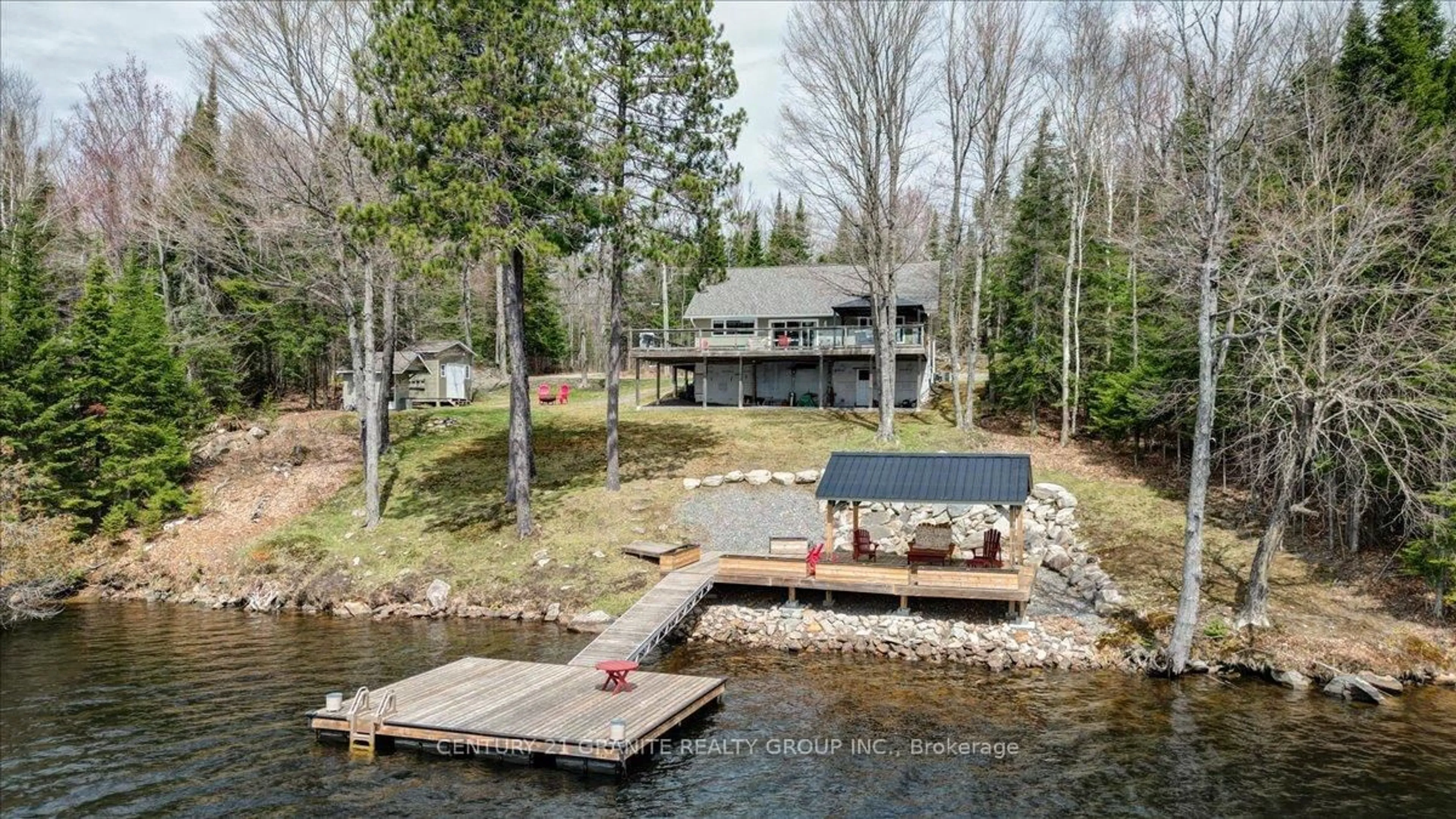A pic from outside/outdoor area/front of a property/back of a property/a pic from drone, water/lake/river/ocean view for 539 Dog Bay Rd #A, Maynooth Ontario K0L 2S0
