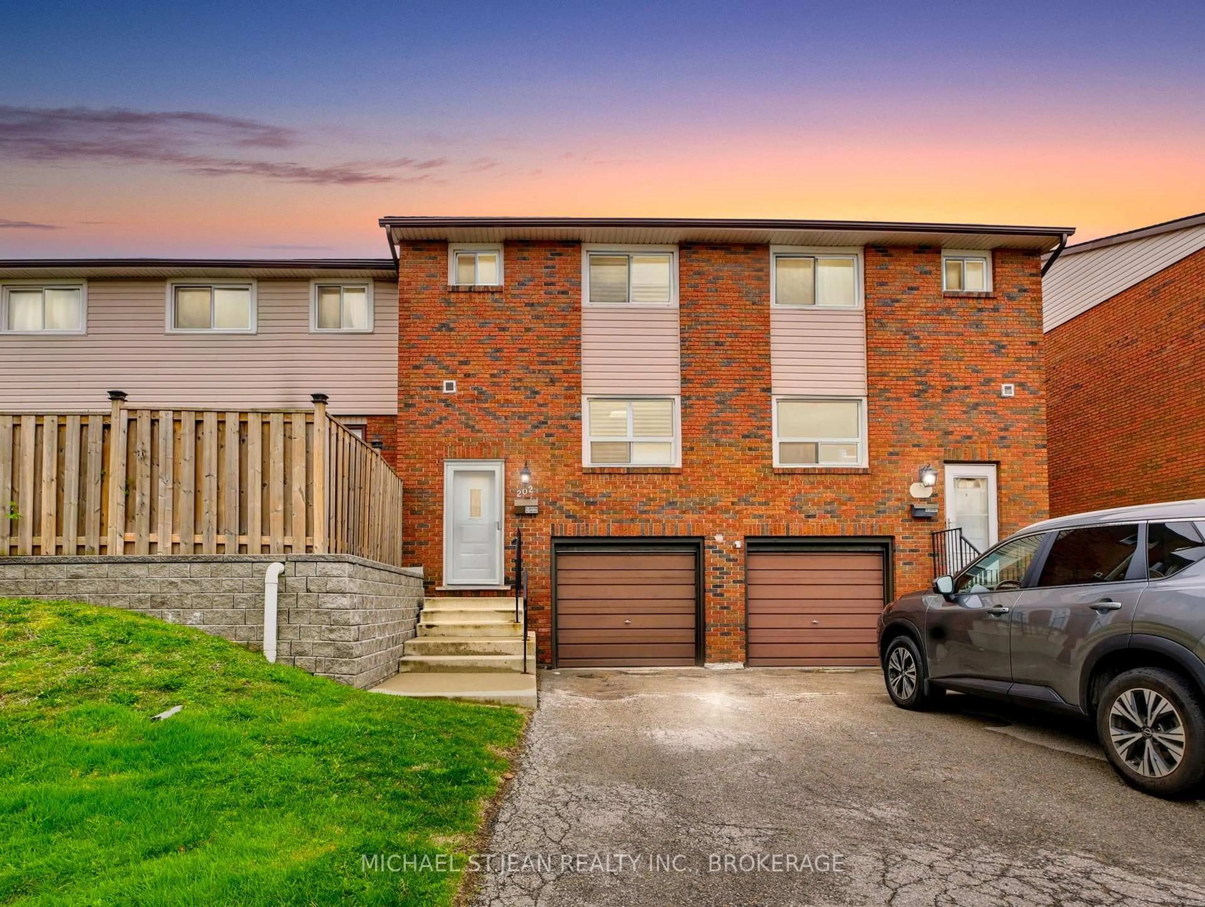 Home with brick exterior material, street for 202 Lavina Cres #10, Hamilton Ontario L9C 6R8