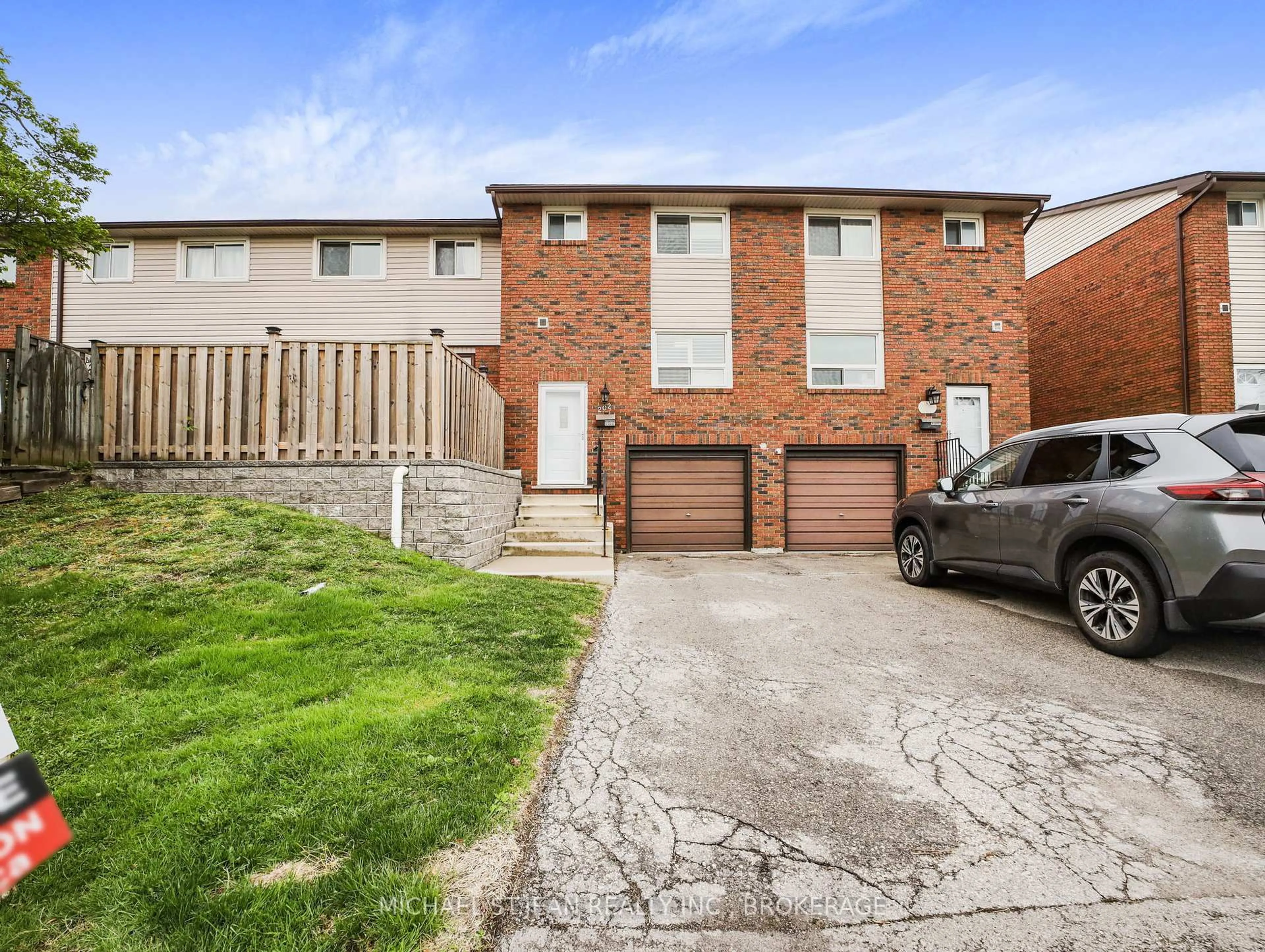 Home with brick exterior material, street for 202 Lavina Cres #10, Hamilton Ontario L9C 6R8