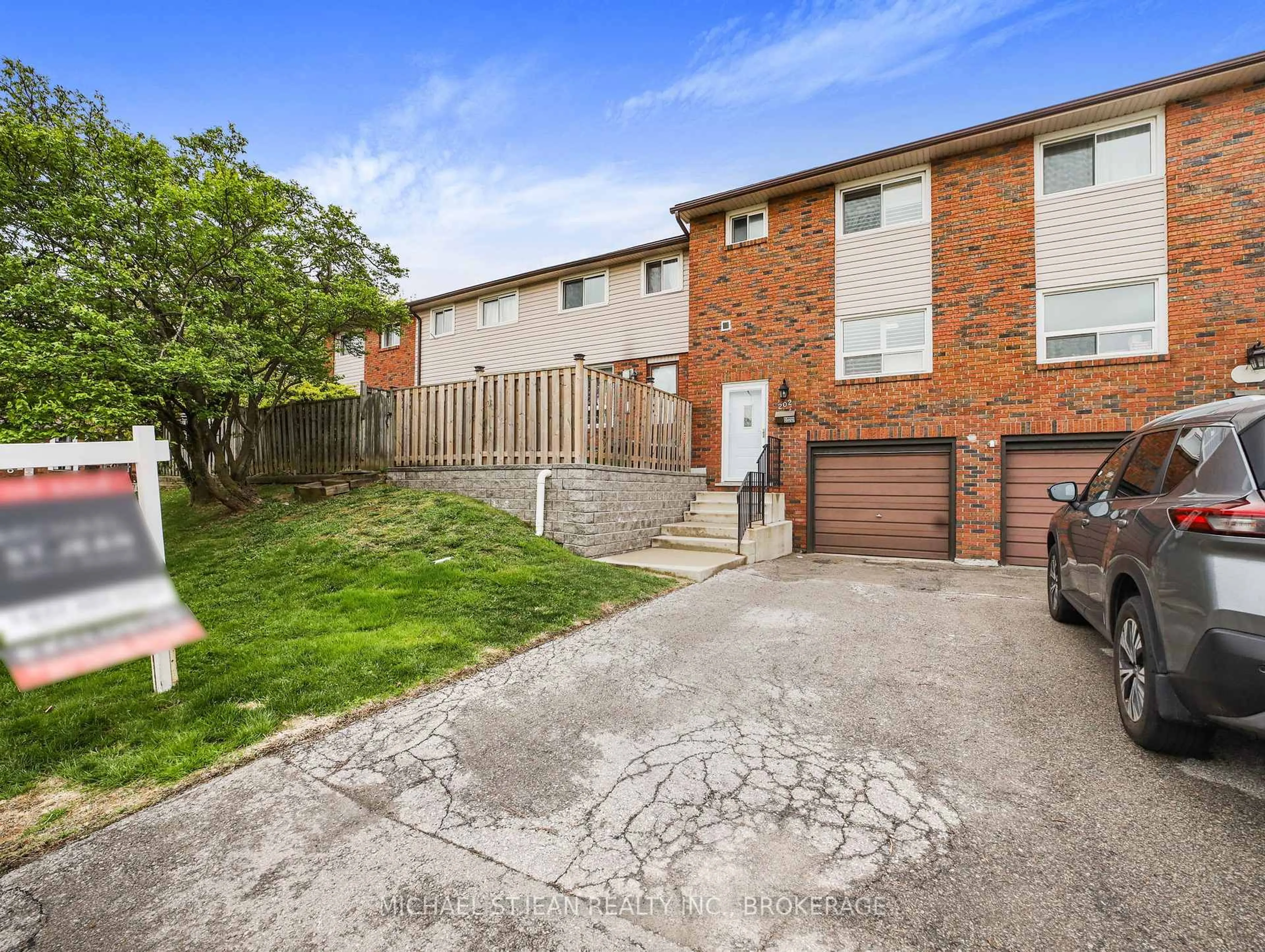 A pic from outside/outdoor area/front of a property/back of a property/a pic from drone, street for 202 Lavina Cres #10, Hamilton Ontario L9C 6R8
