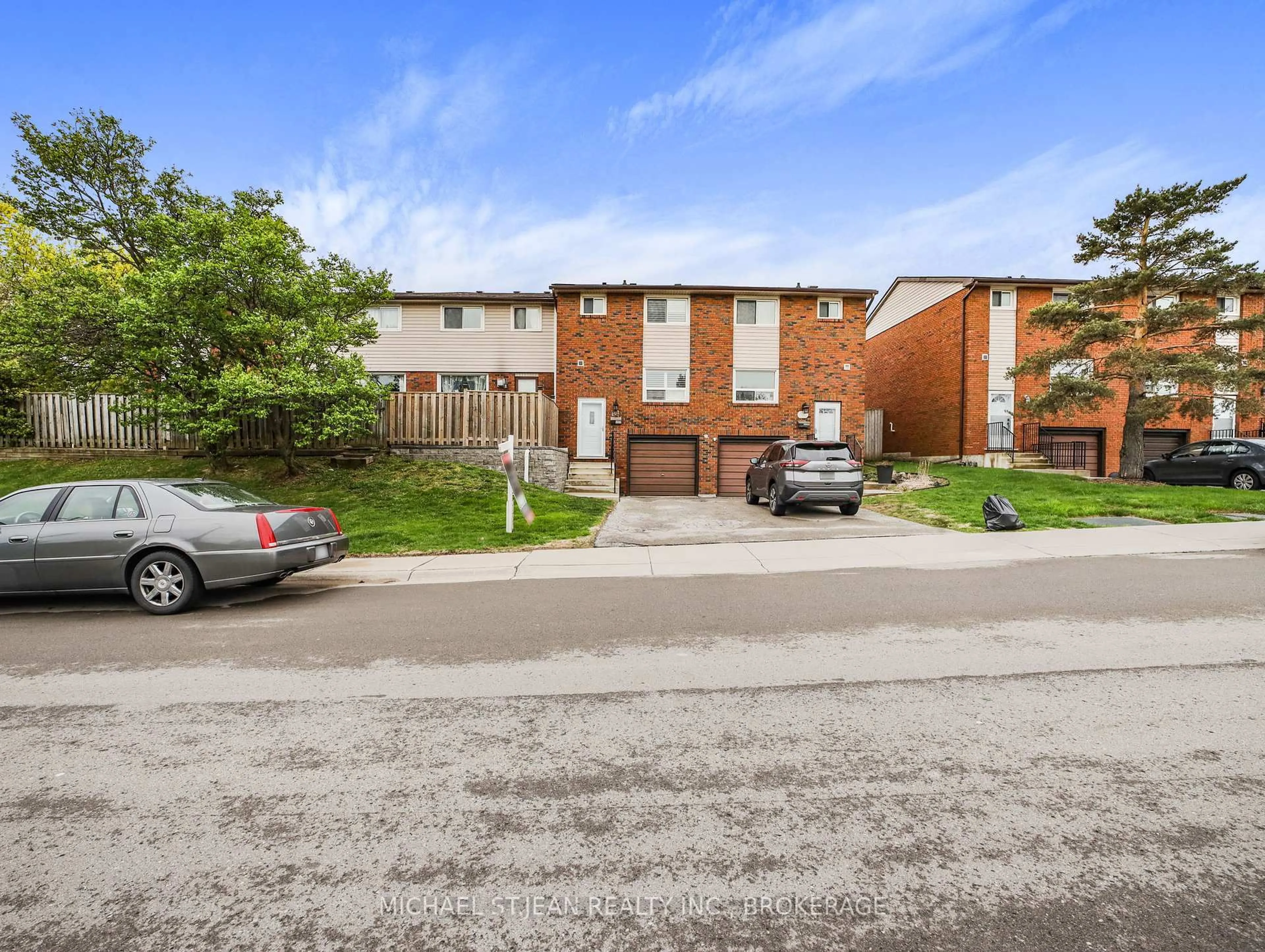 A pic from outside/outdoor area/front of a property/back of a property/a pic from drone, street for 202 Lavina Cres #10, Hamilton Ontario L9C 6R8