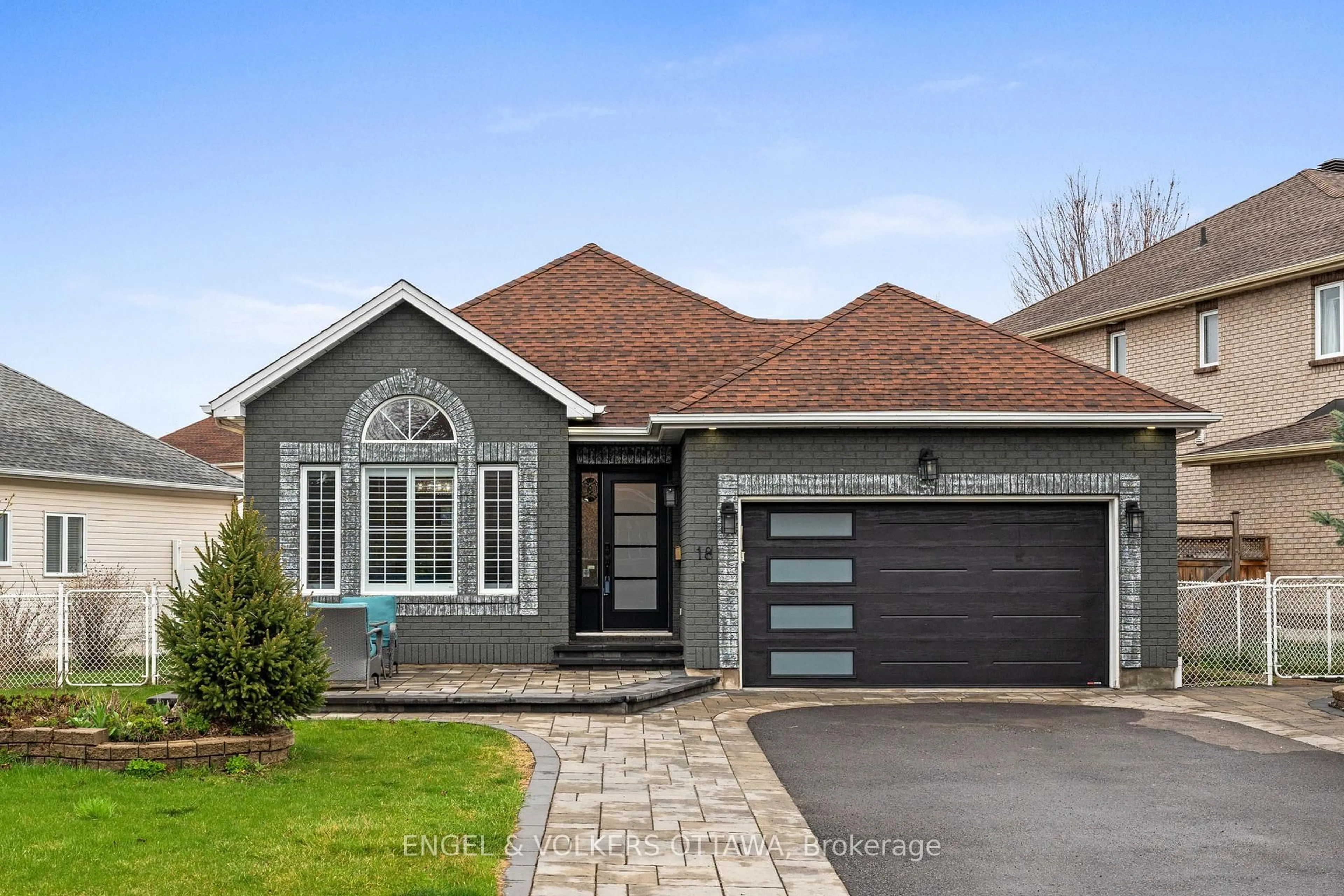 Home with brick exterior material, street for 18 Fanterra Way, Ottawa Ontario K1T 3Y7