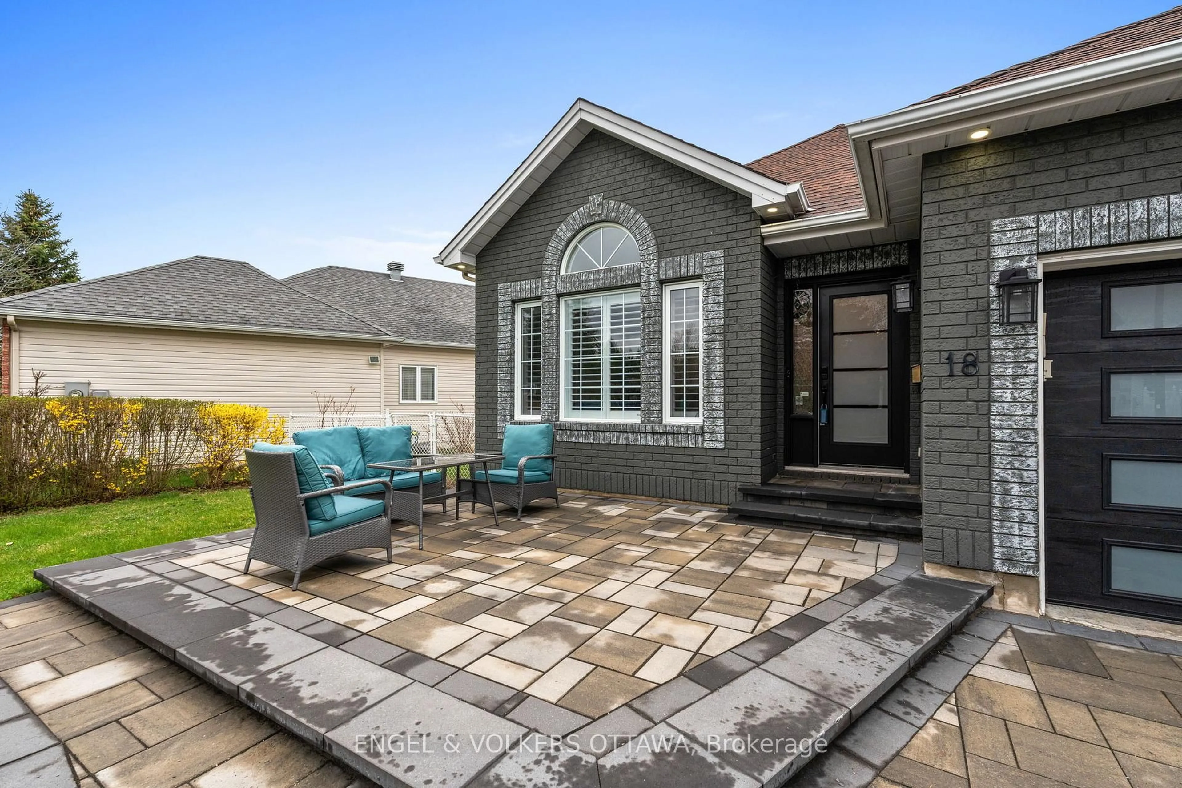 Home with brick exterior material, street for 18 Fanterra Way, Ottawa Ontario K1T 3Y7