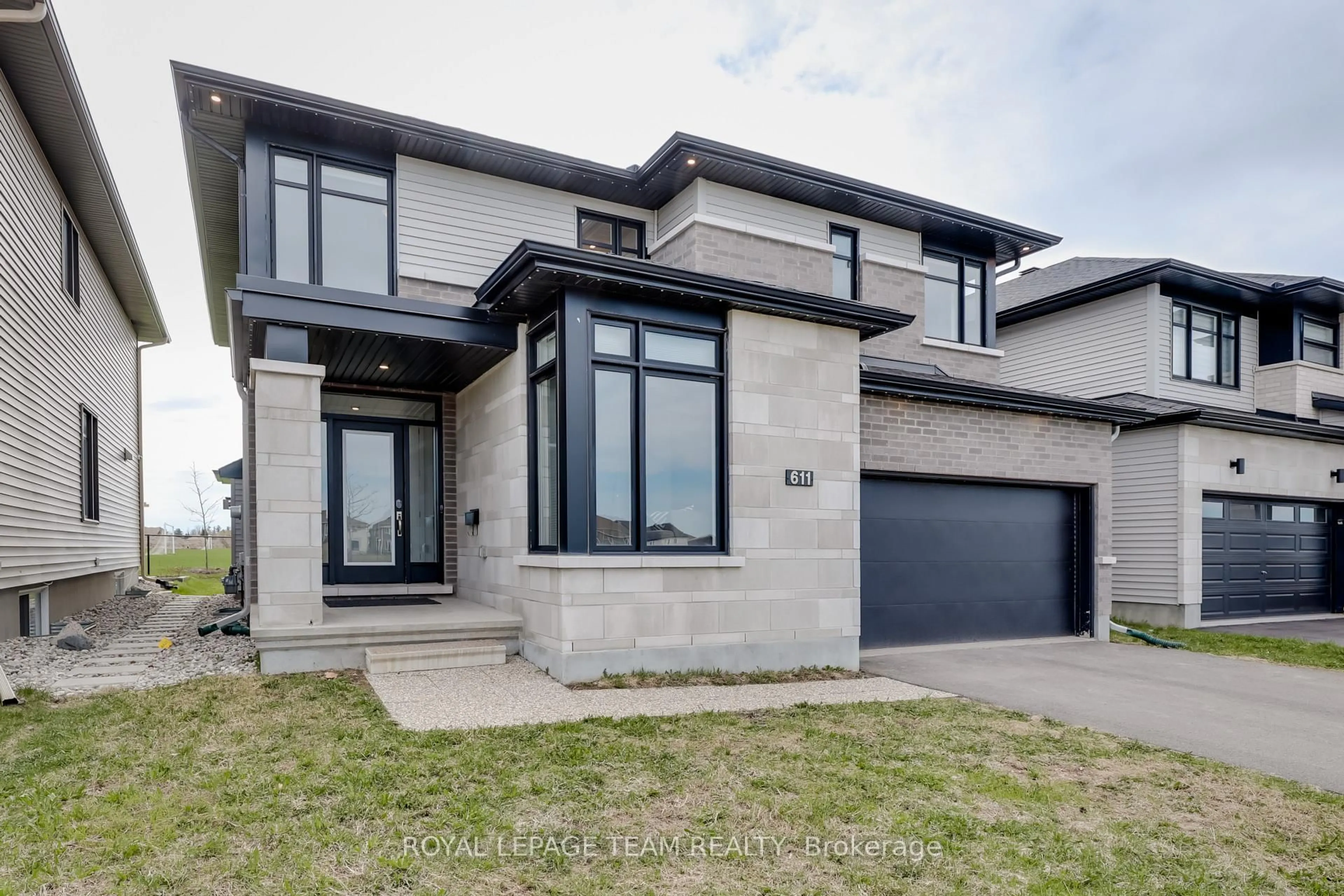 Home with brick exterior material, street for 611 Triangle St, Stittsville Ontario K2V 0L8