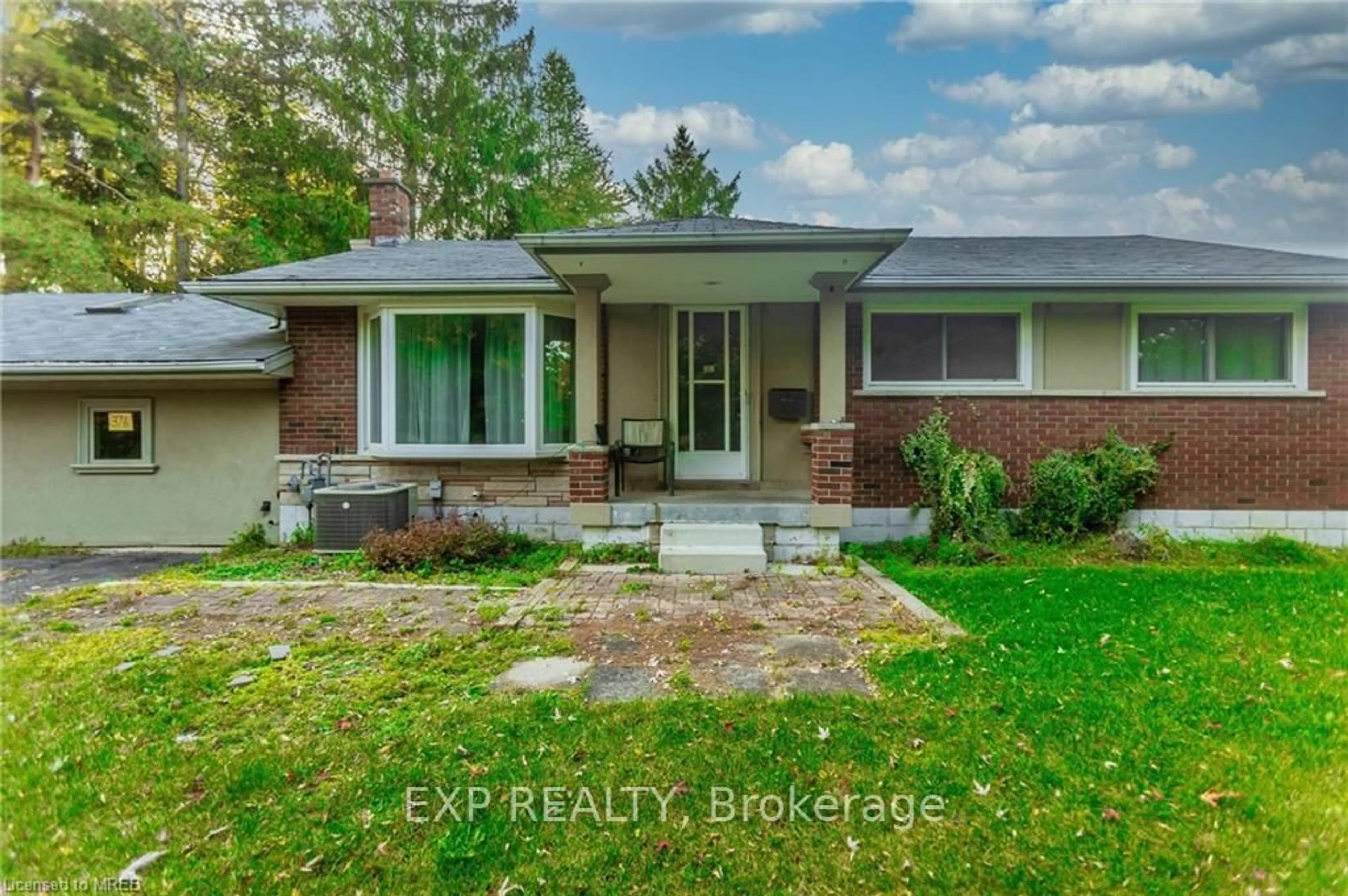 Home with brick exterior material, street for 376 Philip Pl #B, Hamilton Ontario L9G 3G8