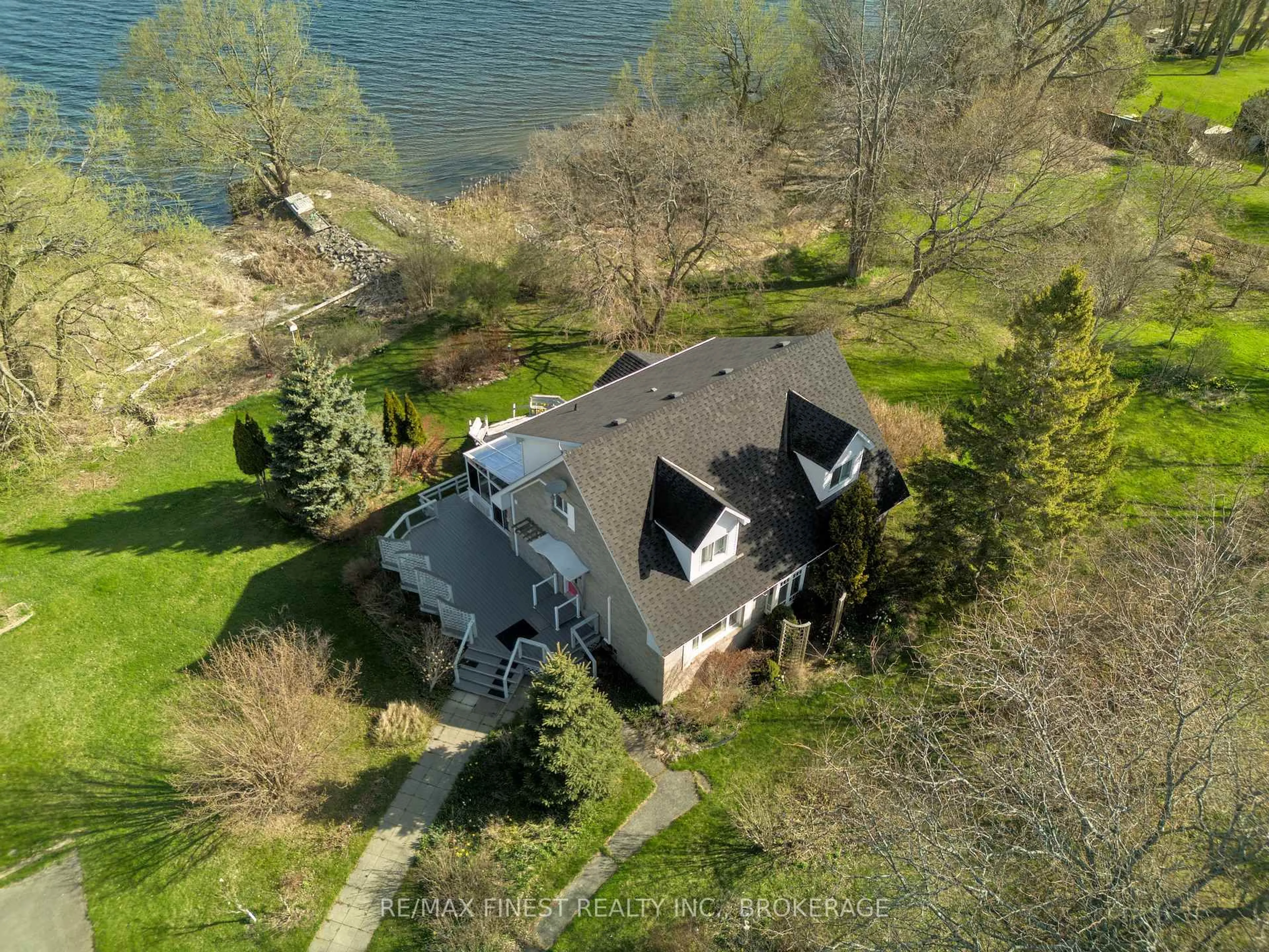 A pic from outside/outdoor area/front of a property/back of a property/a pic from drone, water/lake/river/ocean view for 9820 Front Rd, Stella Ontario K0H 2S0