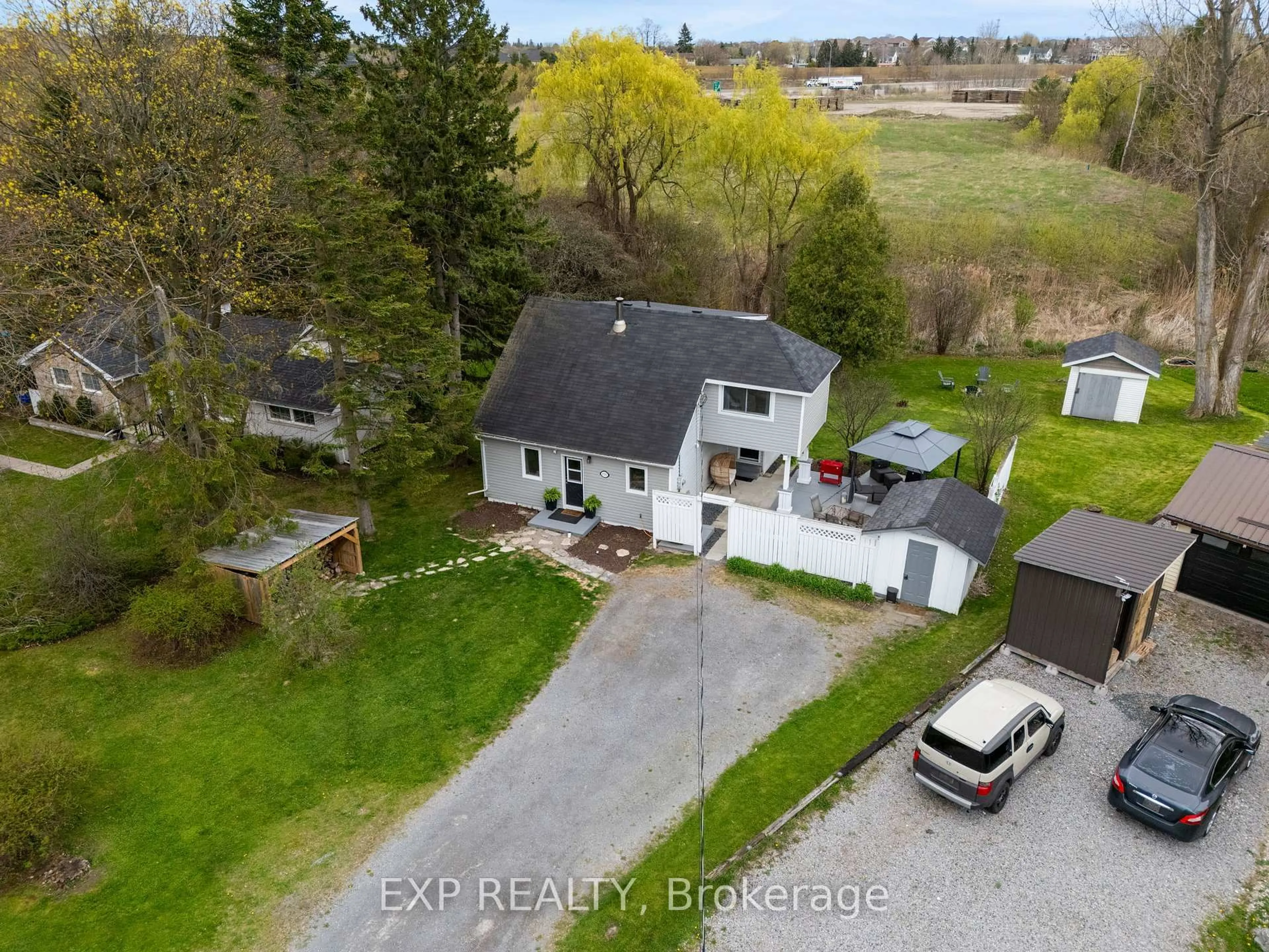 A pic from outside/outdoor area/front of a property/back of a property/a pic from drone, street for 8785 Slater St, Hamilton Township Ontario K9A 0V1