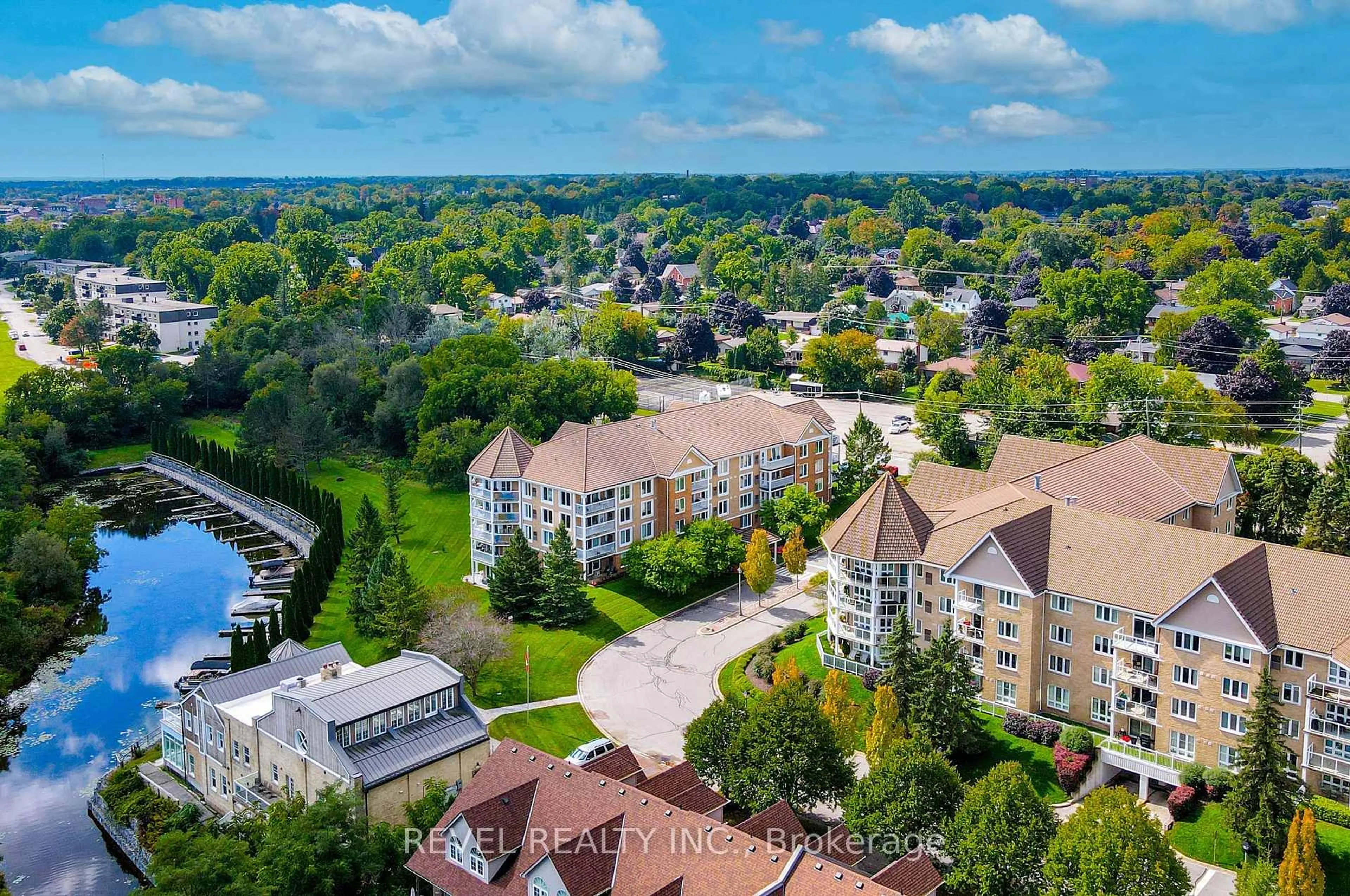 A pic from outside/outdoor area/front of a property/back of a property/a pic from drone, city buildings view from balcony for 50 RIVERMILL Blvd #102, Kawartha Lakes Ontario K9V 6C1