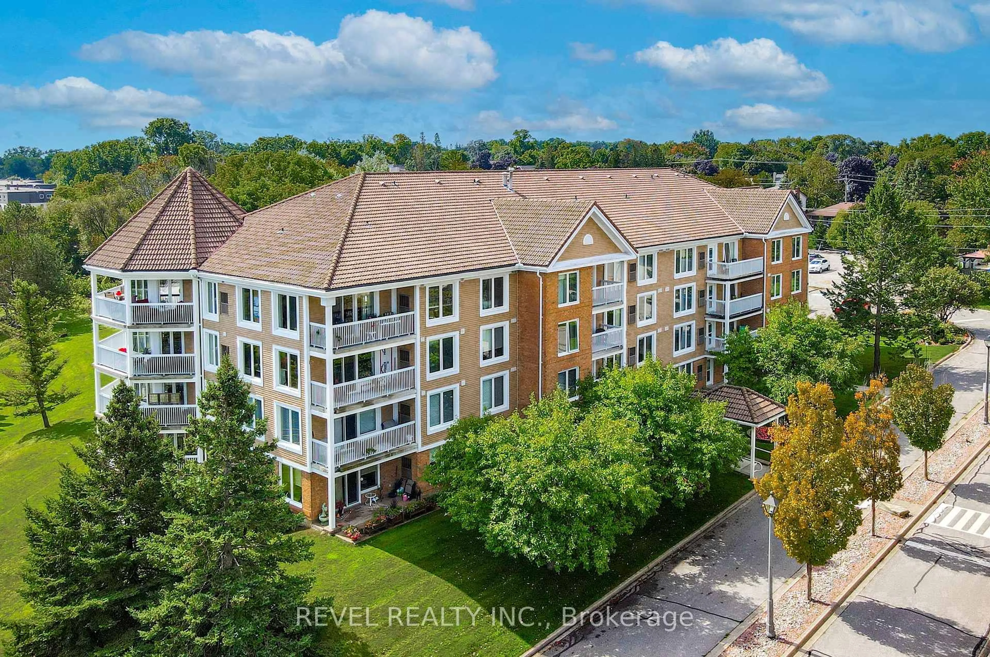 A pic from outside/outdoor area/front of a property/back of a property/a pic from drone, city buildings view from balcony for 50 RIVERMILL Blvd #102, Kawartha Lakes Ontario K9V 6C1