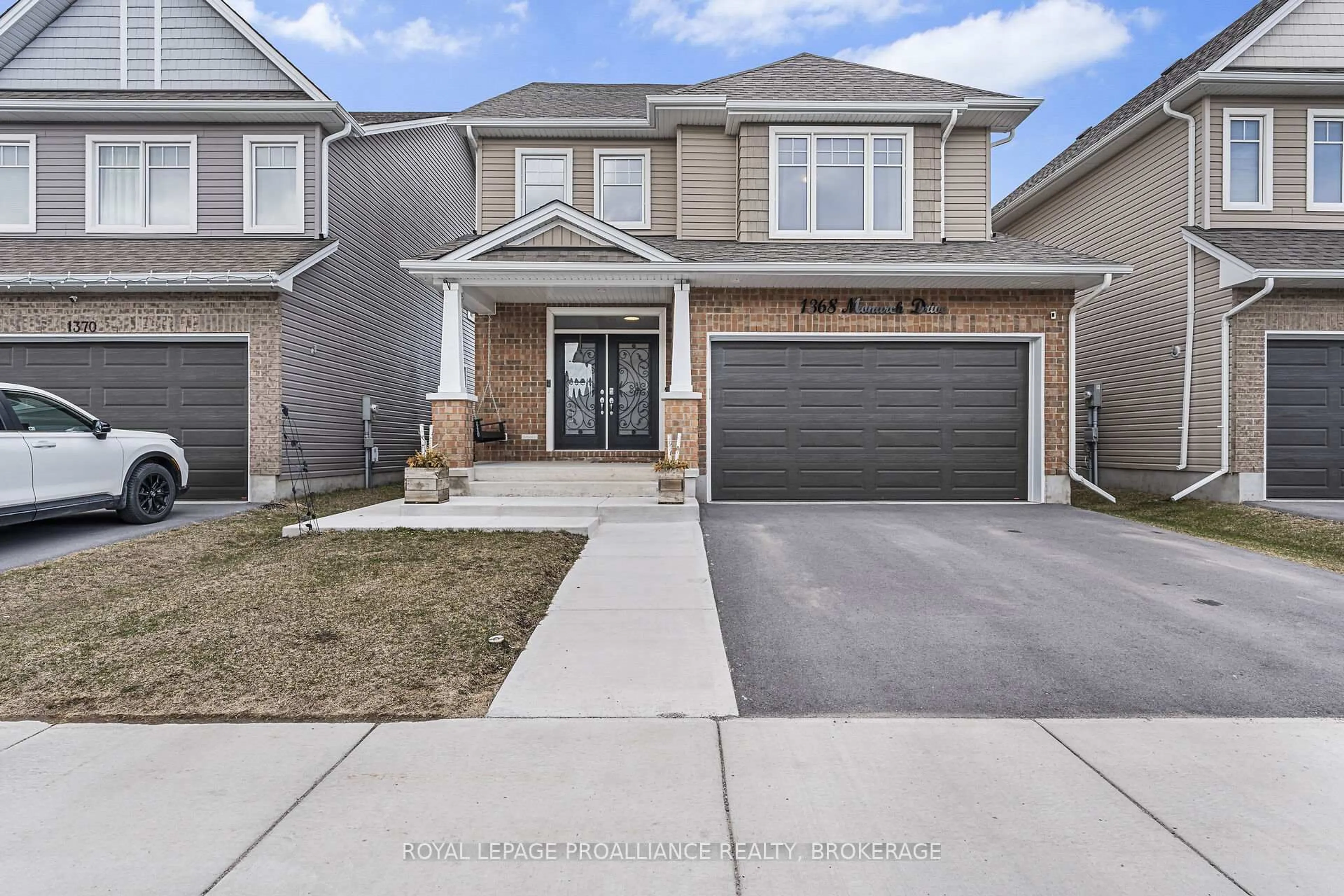 Home with brick exterior material, street for 1368 MONARCH Dr, Kingston Ontario K7P 0S2