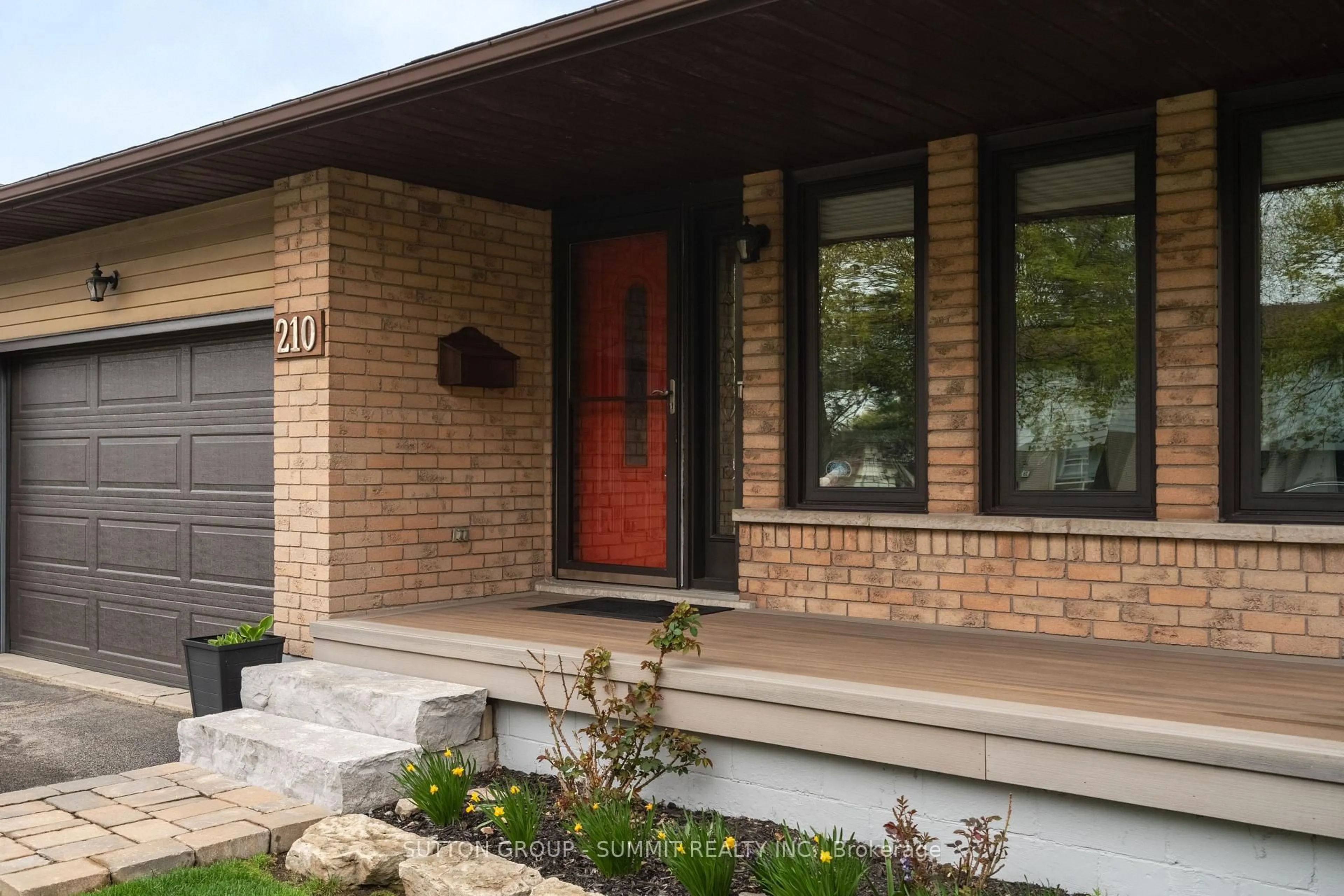 Home with brick exterior material, street for 210 Clifton Downs Rd, Hamilton Ontario L9C 6Z7
