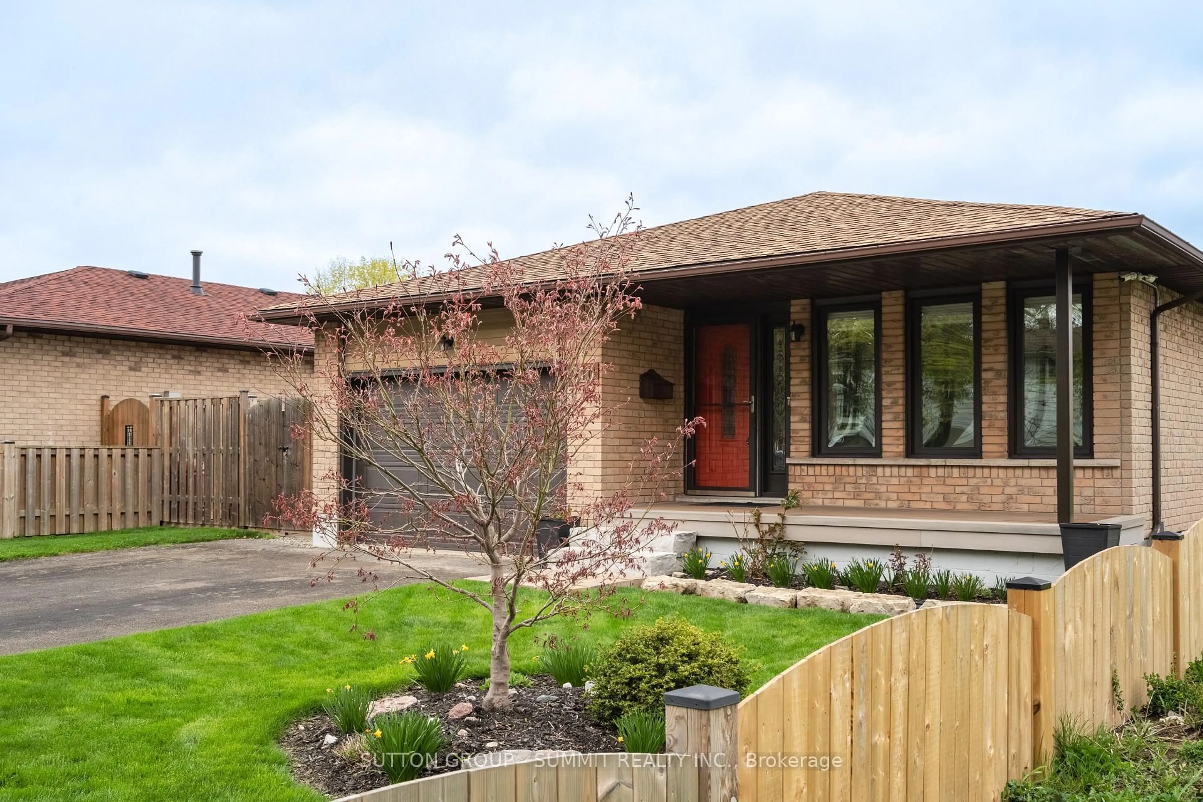 Home with brick exterior material, street for 210 Clifton Downs Rd, Hamilton Ontario L9C 6Z7
