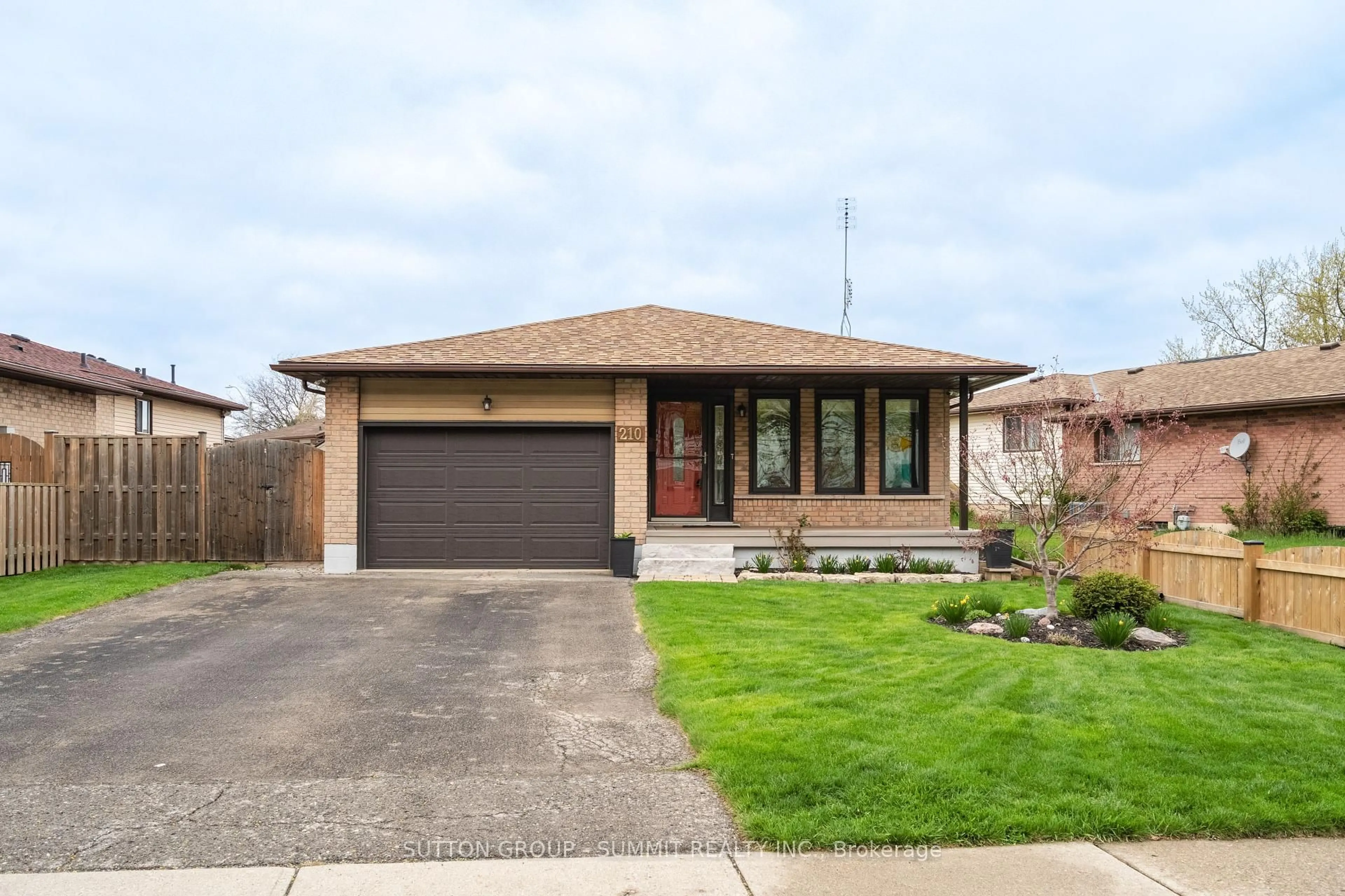 Home with brick exterior material, street for 210 Clifton Downs Rd, Hamilton Ontario L9C 6Z7