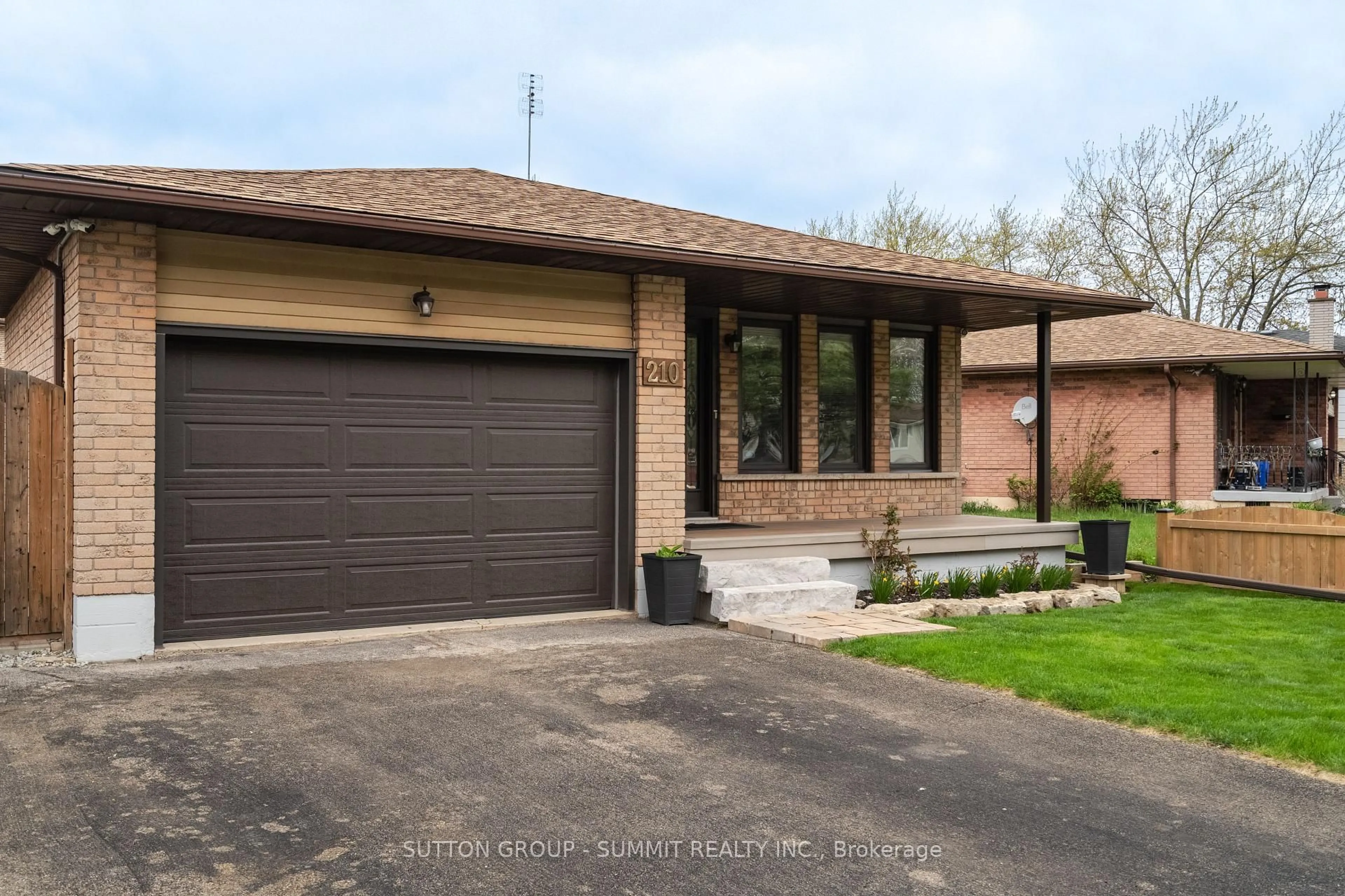 Home with brick exterior material, street for 210 Clifton Downs Rd, Hamilton Ontario L9C 6Z7