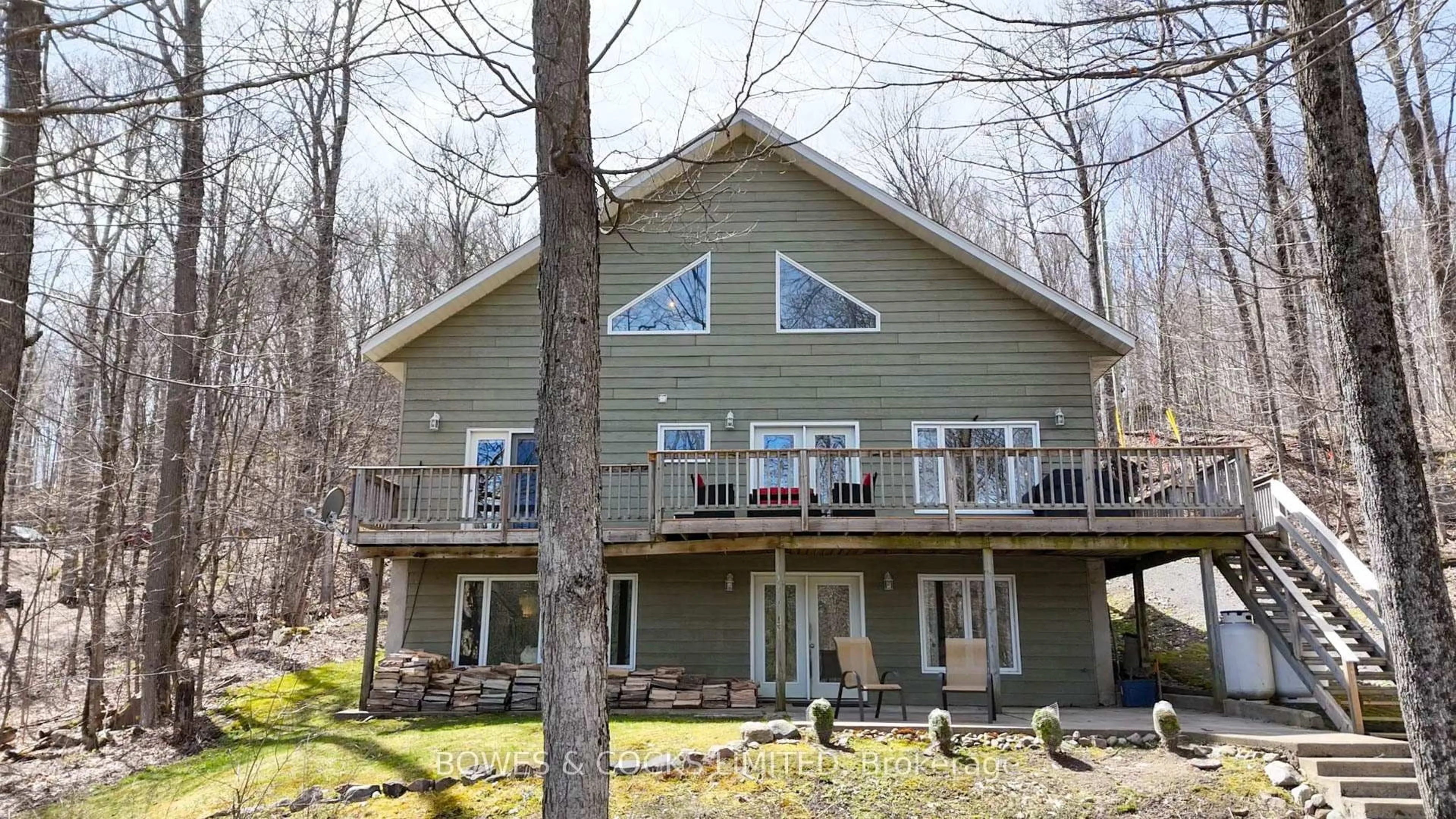 Home with vinyl exterior material, water/lake/river/ocean view for 451 West Diamond Lake Rd, Haliburton Ontario K0L 2A0