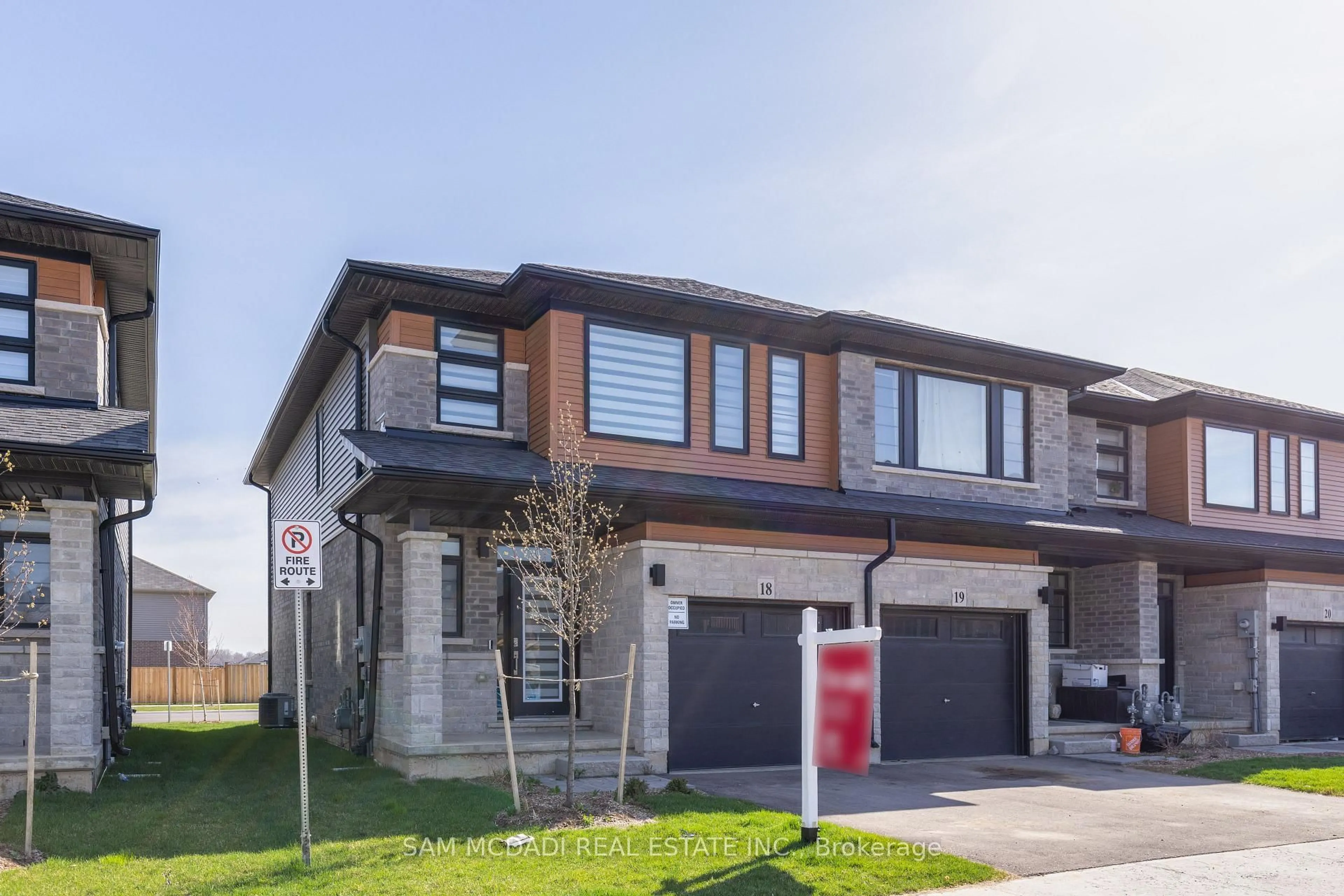 Home with brick exterior material, street for 461 Blackburn Dr #18, Brantford Ontario N3T 0W9