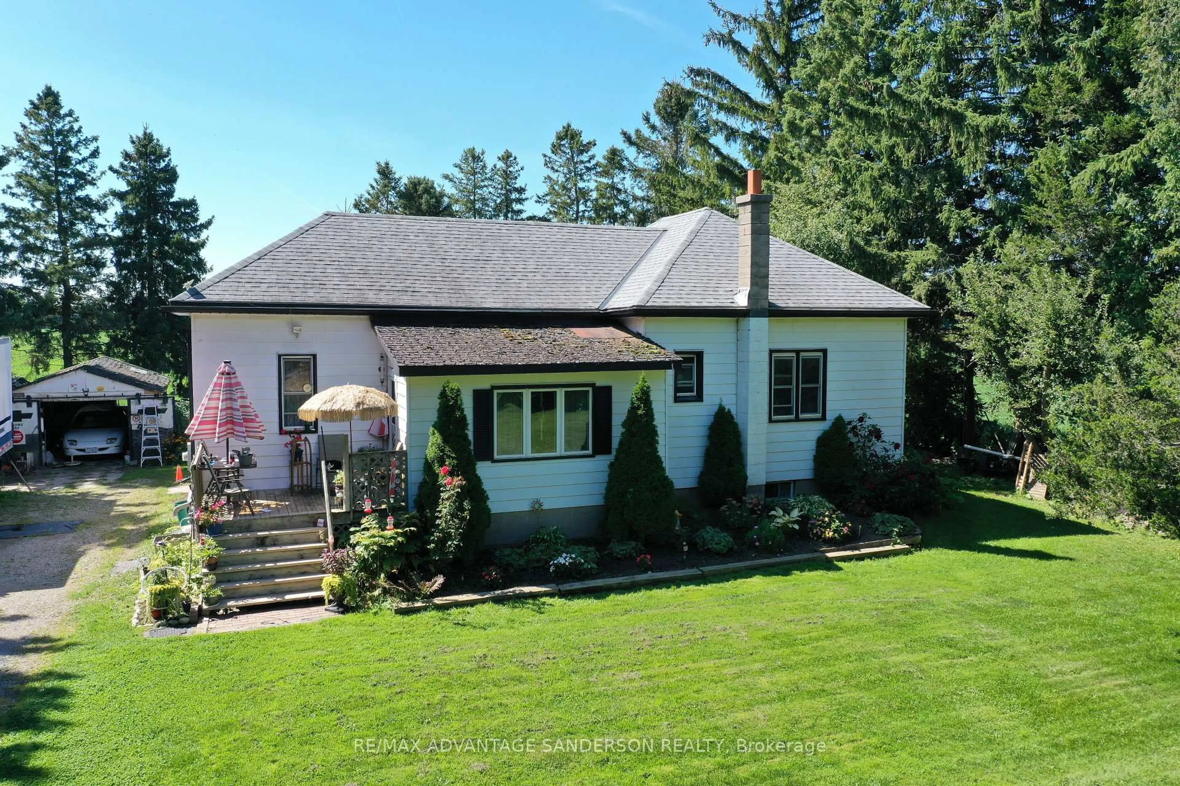 A pic from outside/outdoor area/front of a property/back of a property/a pic from drone, unknown for 24441 Bear Creek Rd, Middlesex Centre Ontario N0M 2A0