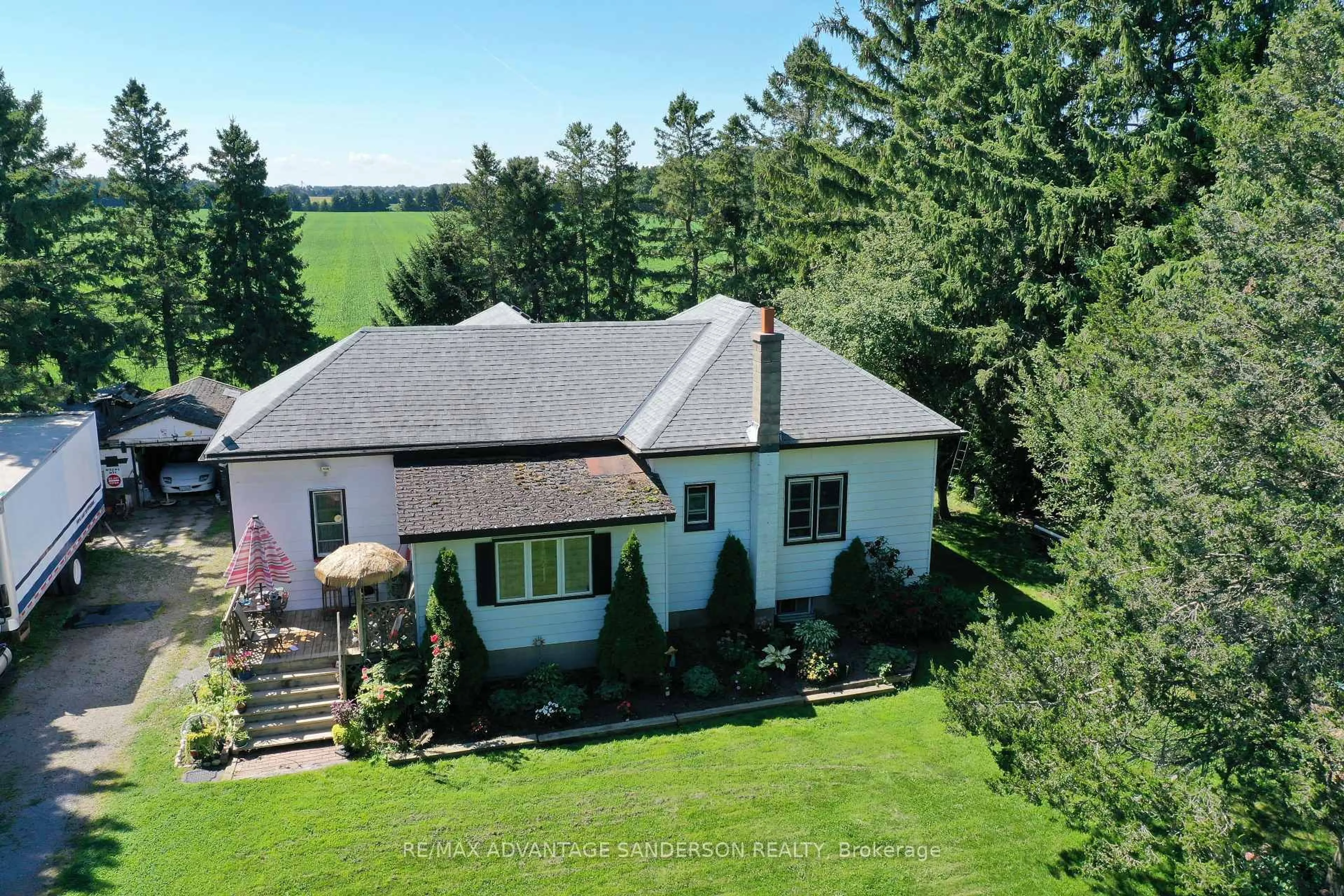 A pic from outside/outdoor area/front of a property/back of a property/a pic from drone, water/lake/river/ocean view for 24441 Bear Creek Rd, Middlesex Centre Ontario N0M 2A0