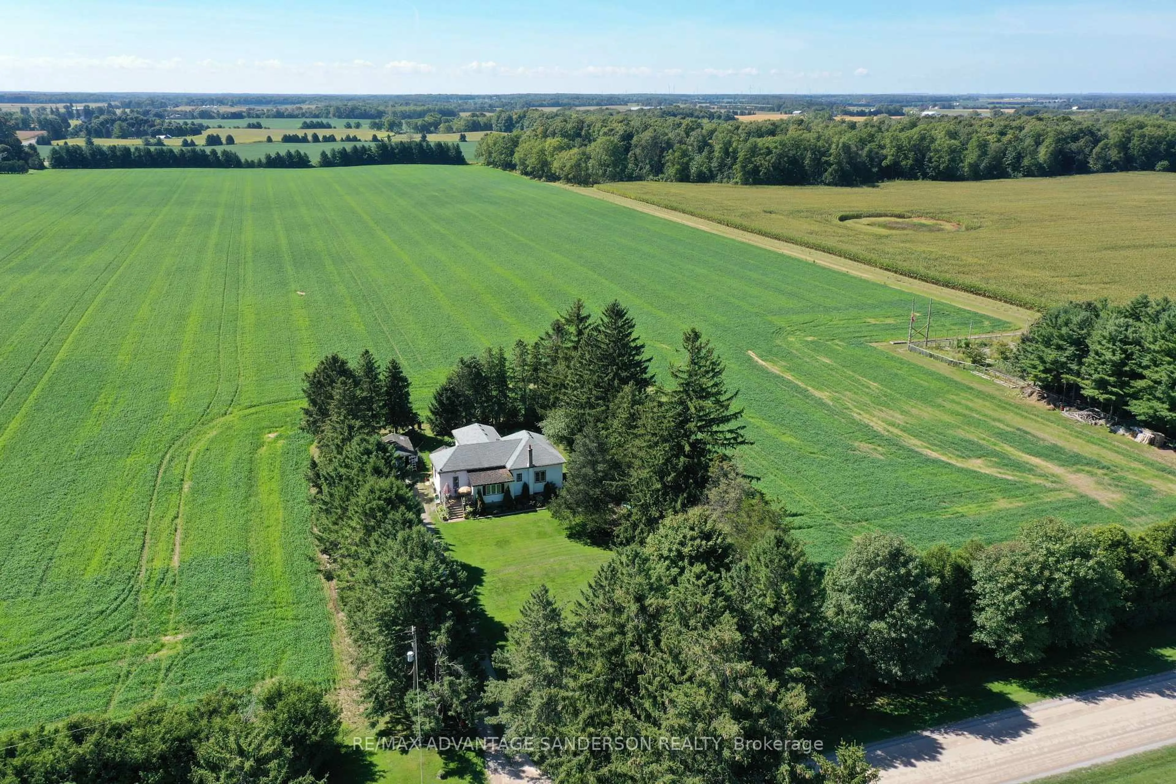 A pic from outside/outdoor area/front of a property/back of a property/a pic from drone, unknown for 24441 Bear Creek Rd, Middlesex Centre Ontario N0M 2A0